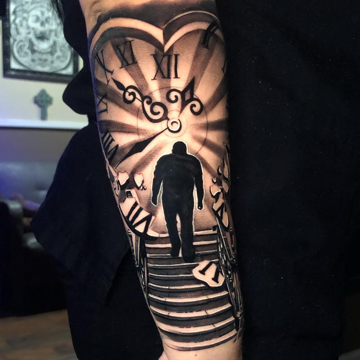 Clock and silhouette realism tattoo on the forearm by Michael Martinez
