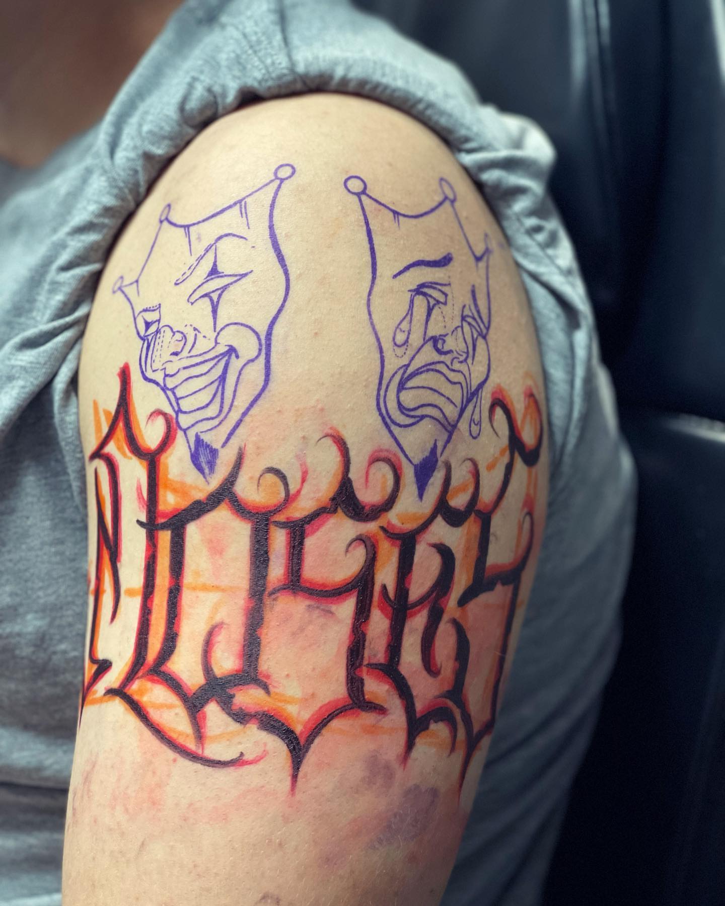 Theater masks American traditional tattoo on the shoulder by Peewee Morales