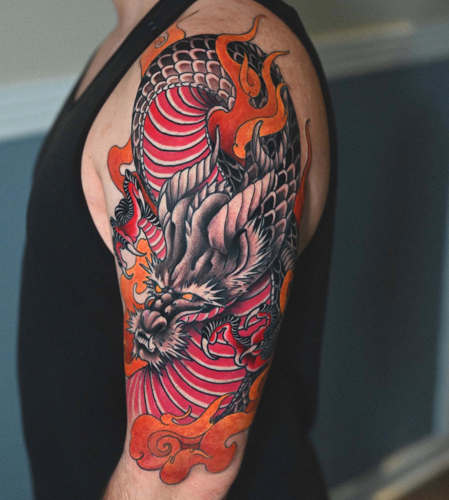 Dragon japanese irezumi tattoo on the upper arm by Lorenzo Lopez