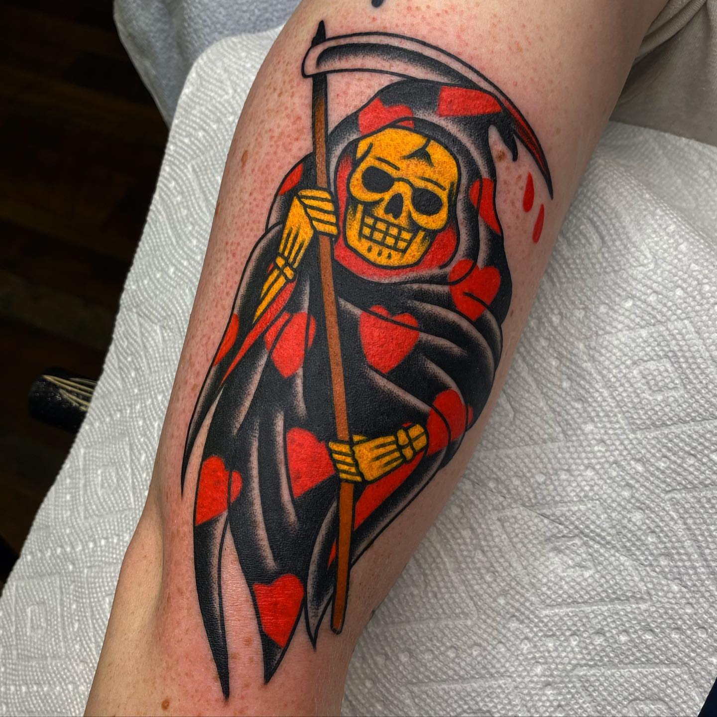Grim reaper American traditional tattoo on the forearm by andrewtattoos