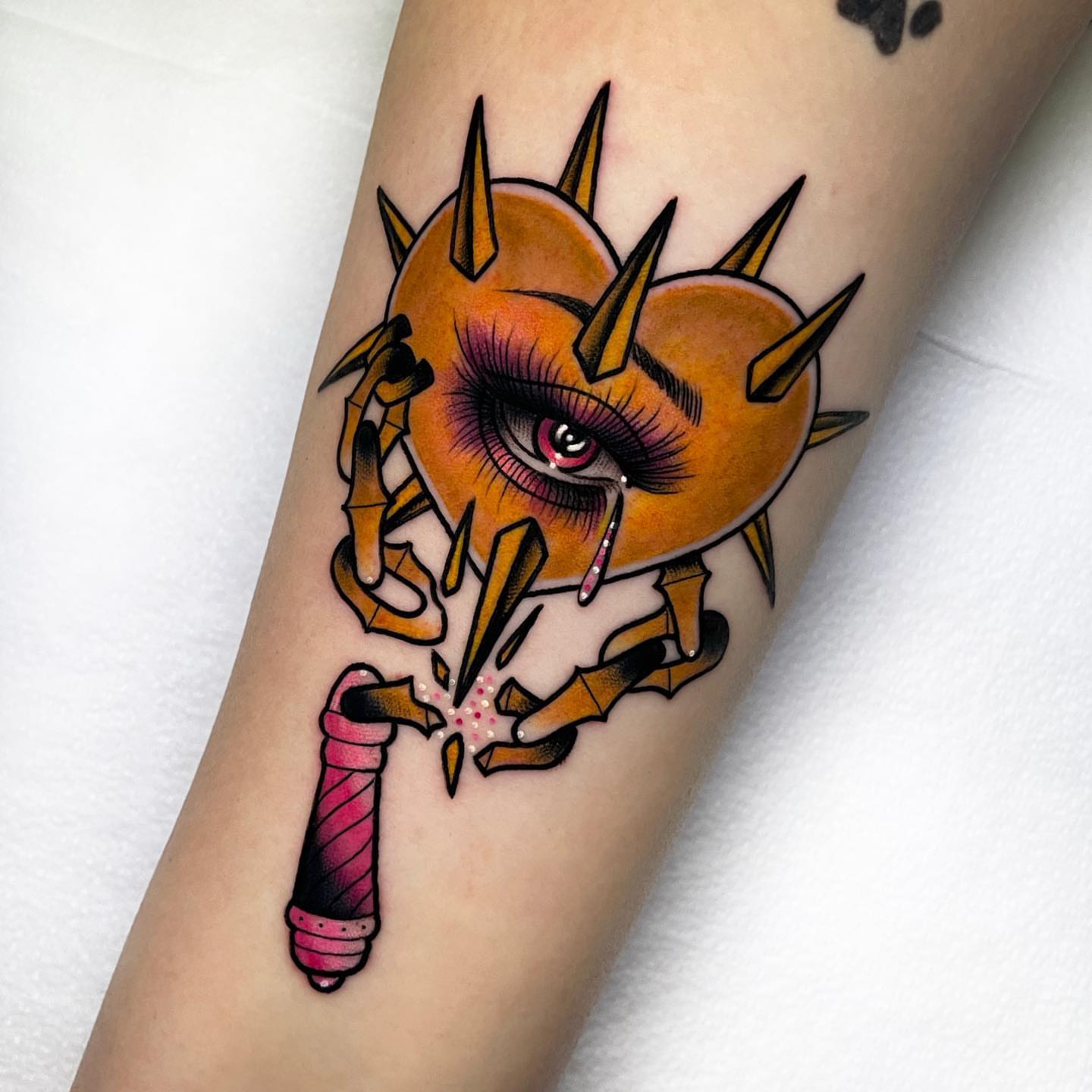 Heart with spikes American traditional tattoo on the forearm by 𝐊𝐚𝐫𝐚 𝐍𝐨𝐞𝐥, Dallas, Texas