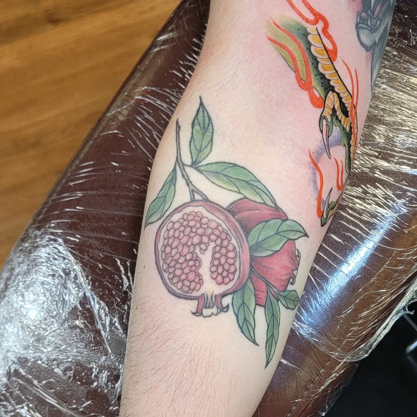 Pomegranate American traditional tattoo on the forearm by ๐๏ธ, Ashland, Virginia