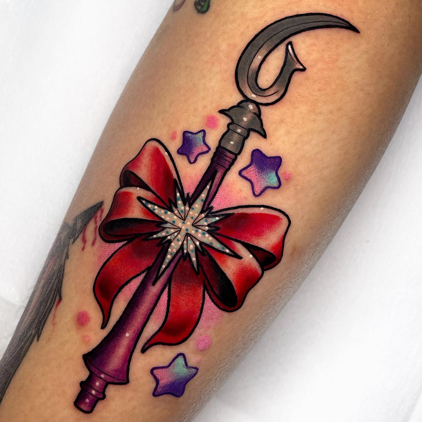 Hook and bow dotwork tattoo on the forearm by πππ«π ππ¨ππ₯, Dallas, Texas