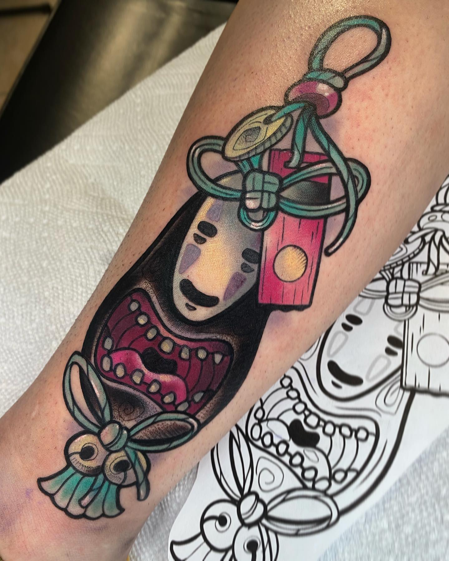 No face ghost American traditional tattoo on the forearm by Kara Klenk