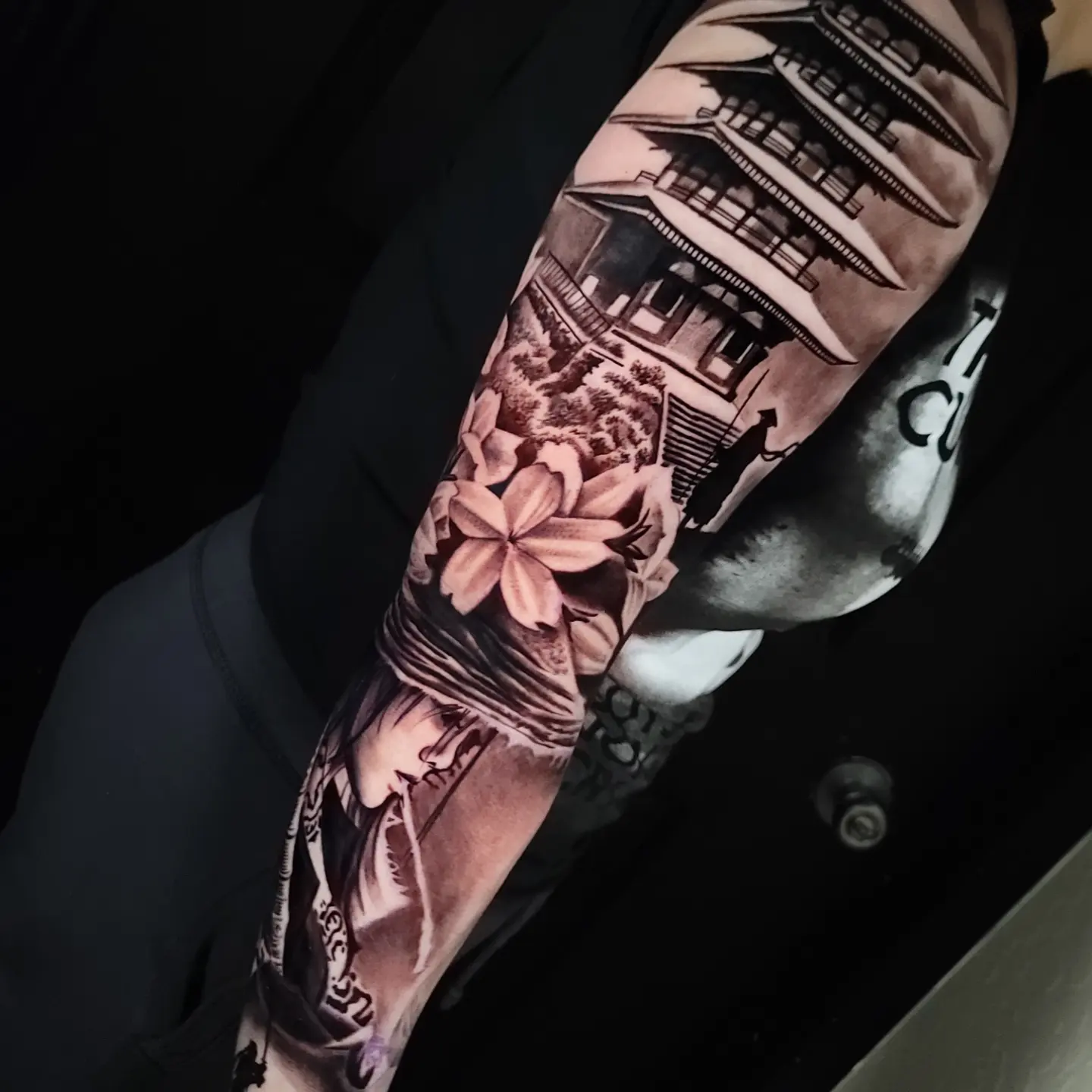 Japanese-style house and flowers japanese irezumi tattoo on the forearm by Angel Lizarraga