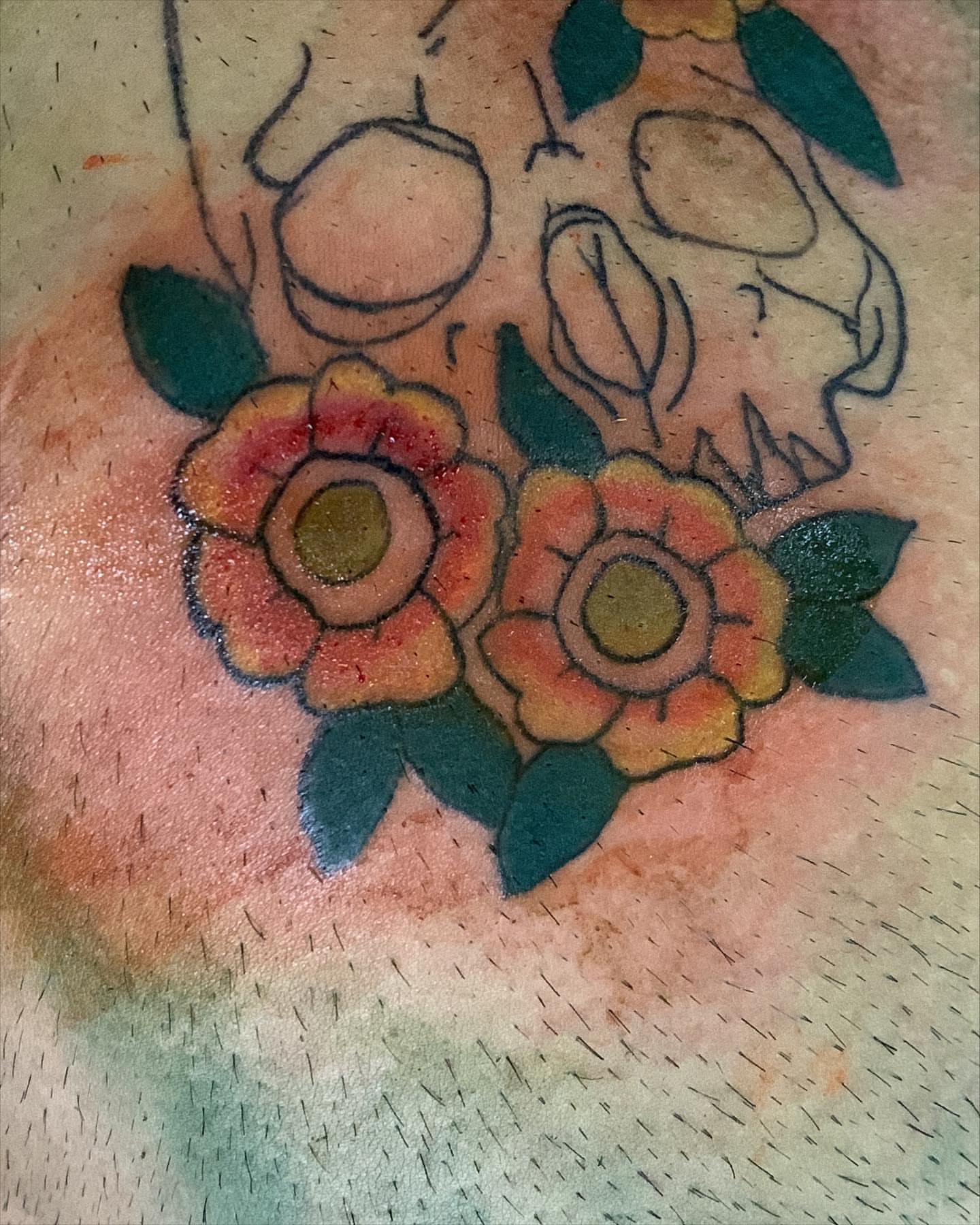 Floral skull American traditional tattoo on the forearm by El Zepa