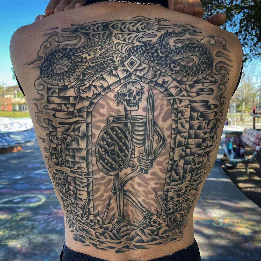 Tattoo by @jesseswanson — black_and_grey, dark_realism