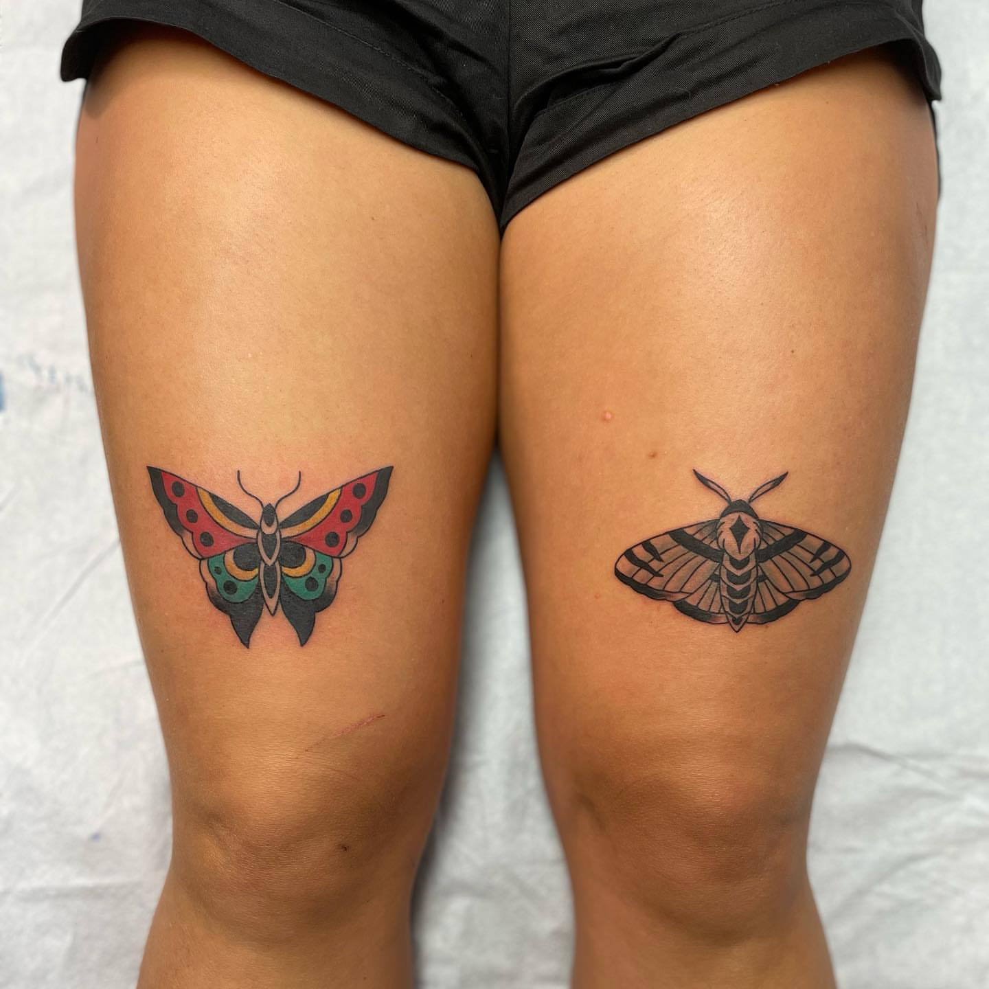 Butterfly moth geometric tattoo on the thigh by Alex Fannin