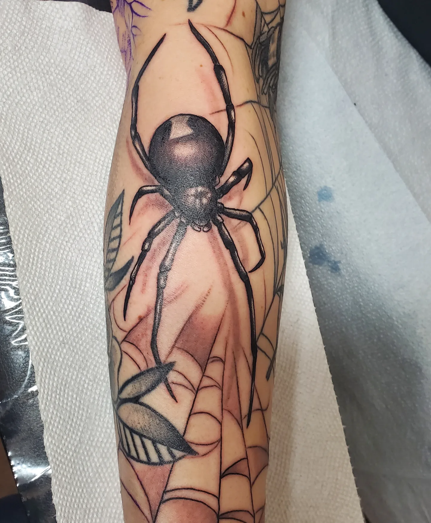 Spider realism tattoo on the forearm by Ginny McCormick, Richmond, Virginia