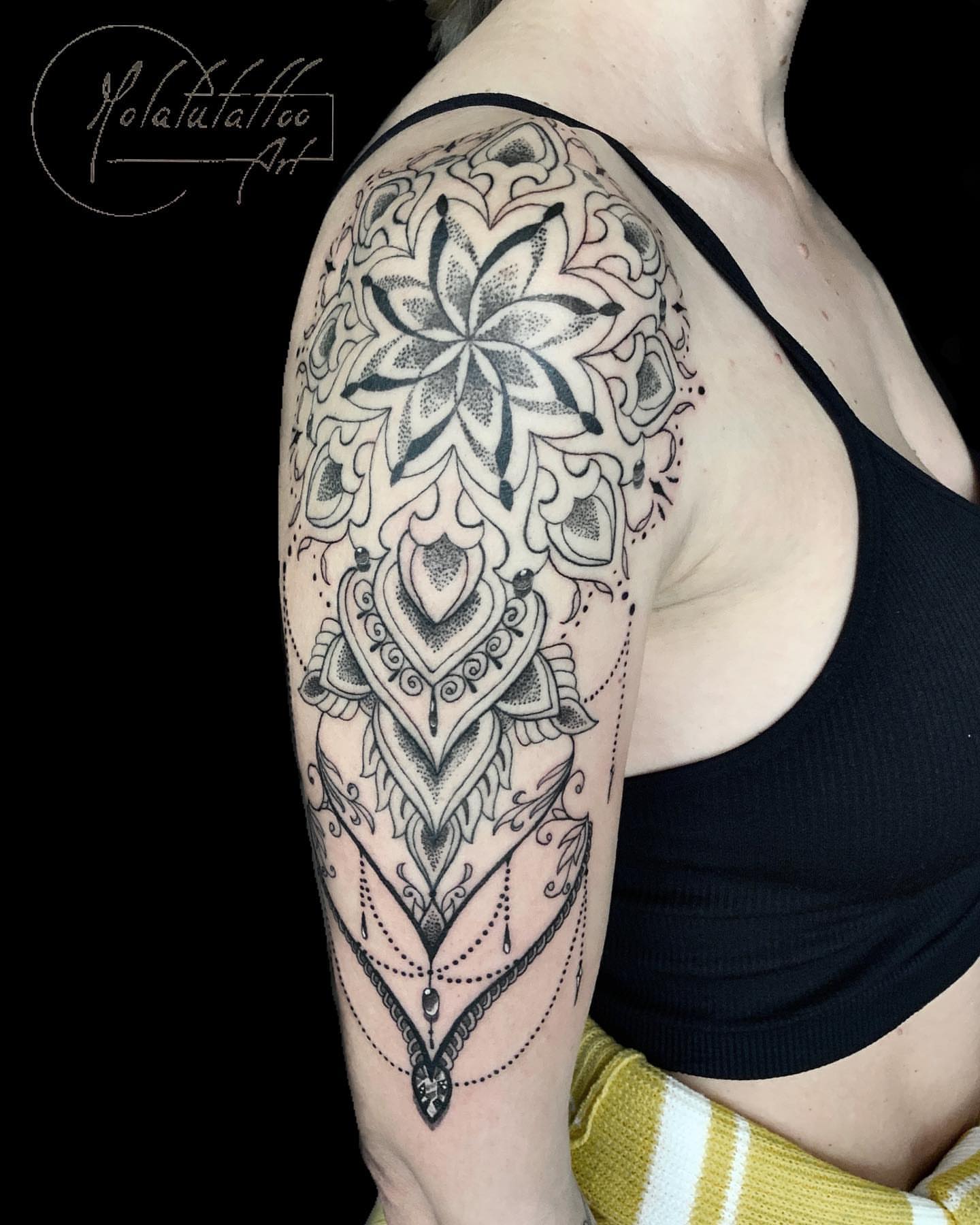 Mandala dotwork tattoo on the shoulder by Molatutattoo