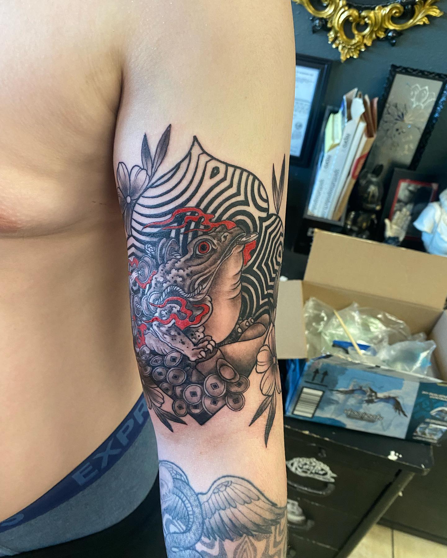 Bird and floral japanese irezumi tattoo on the forearm by Nicholas Jones