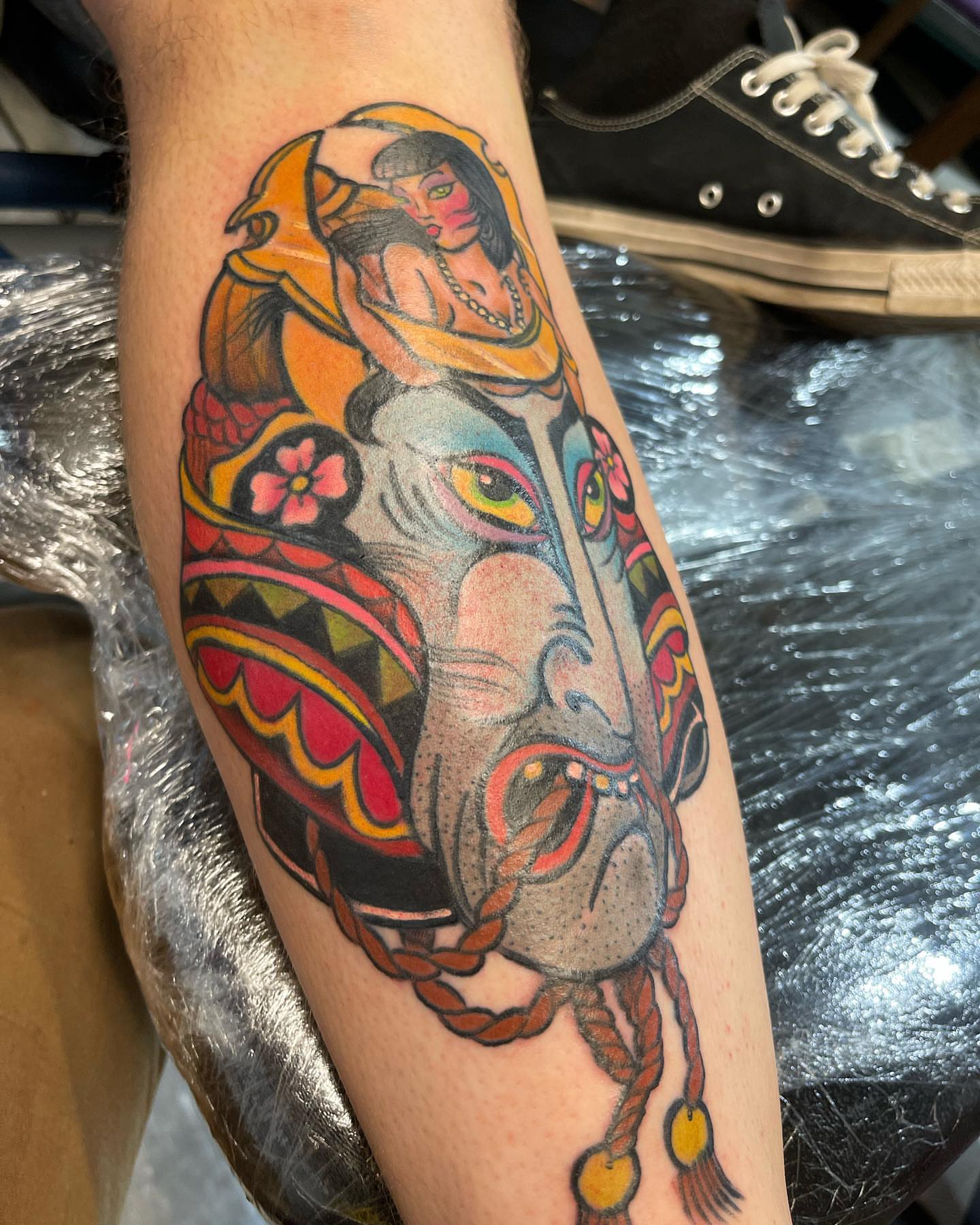 Elephant and woman American traditional tattoo on the forearm by Edward Choat