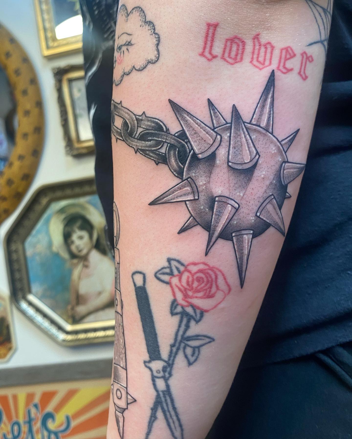 Spiked shield and chain American traditional tattoo on the forearm by ✨ Jaden Belle Tattoos ✨