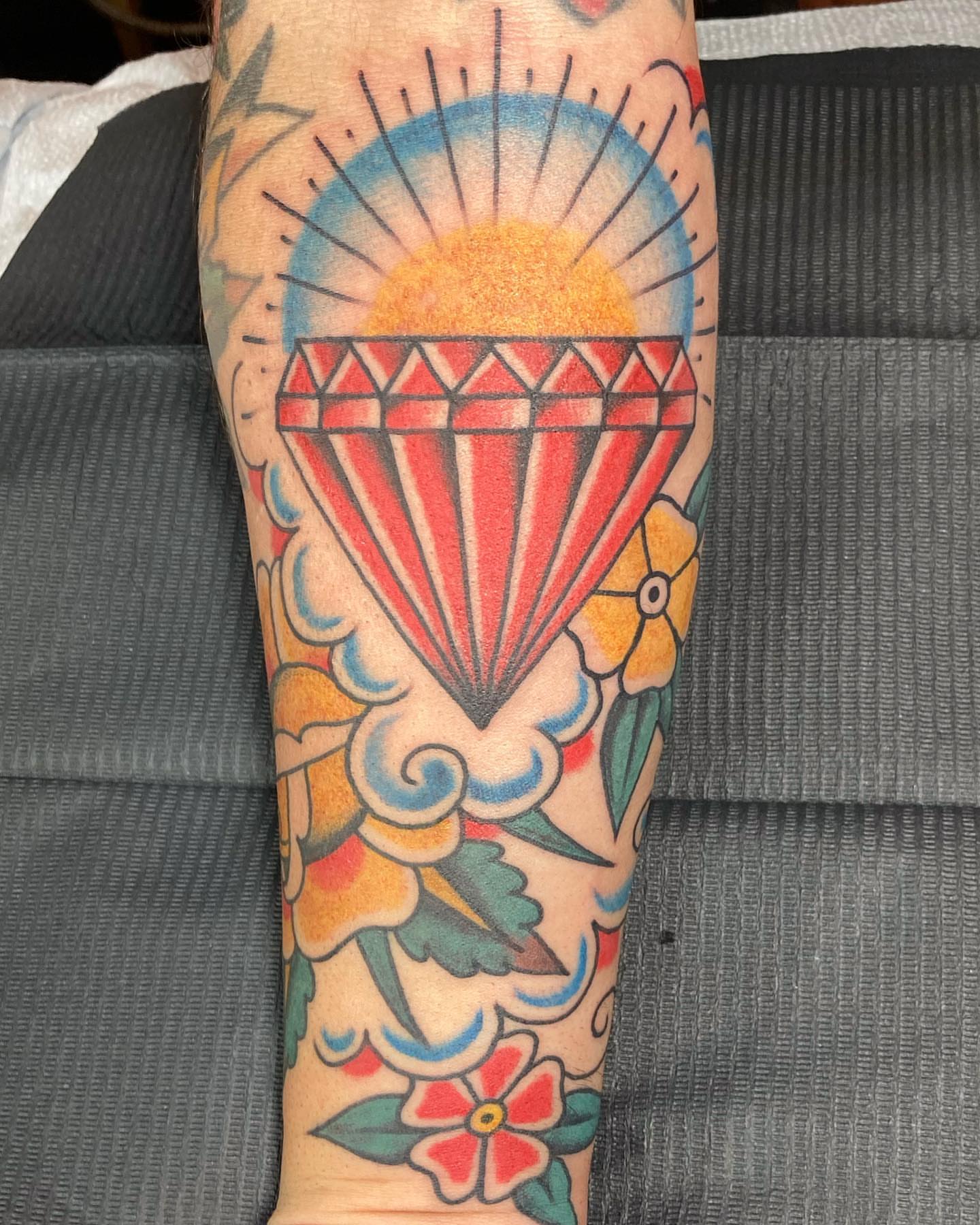 Hot air balloon American traditional tattoo on the forearm by Rob Banks