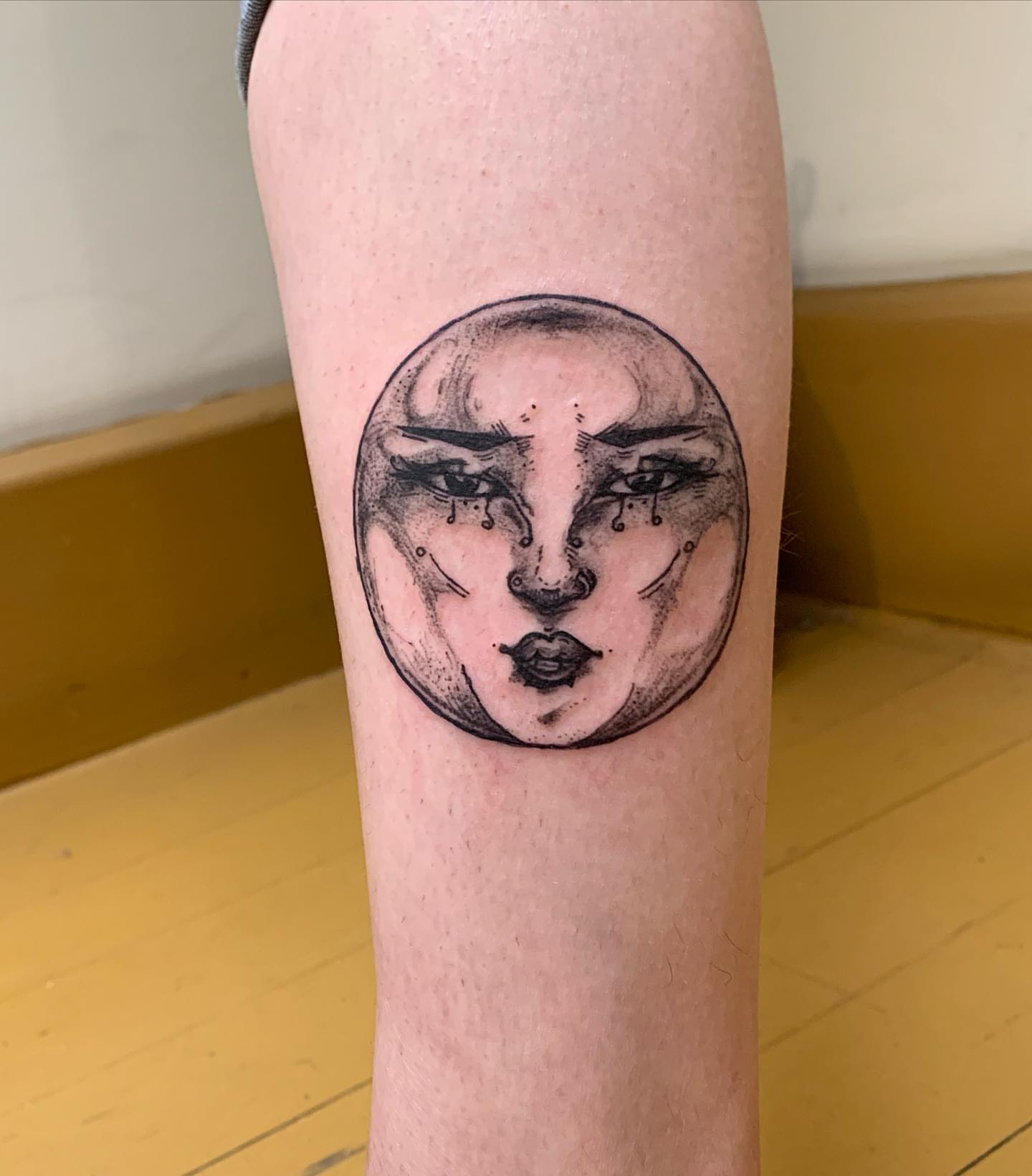 Female face dotwork tattoo on the forearm by ᴀmb⃘er