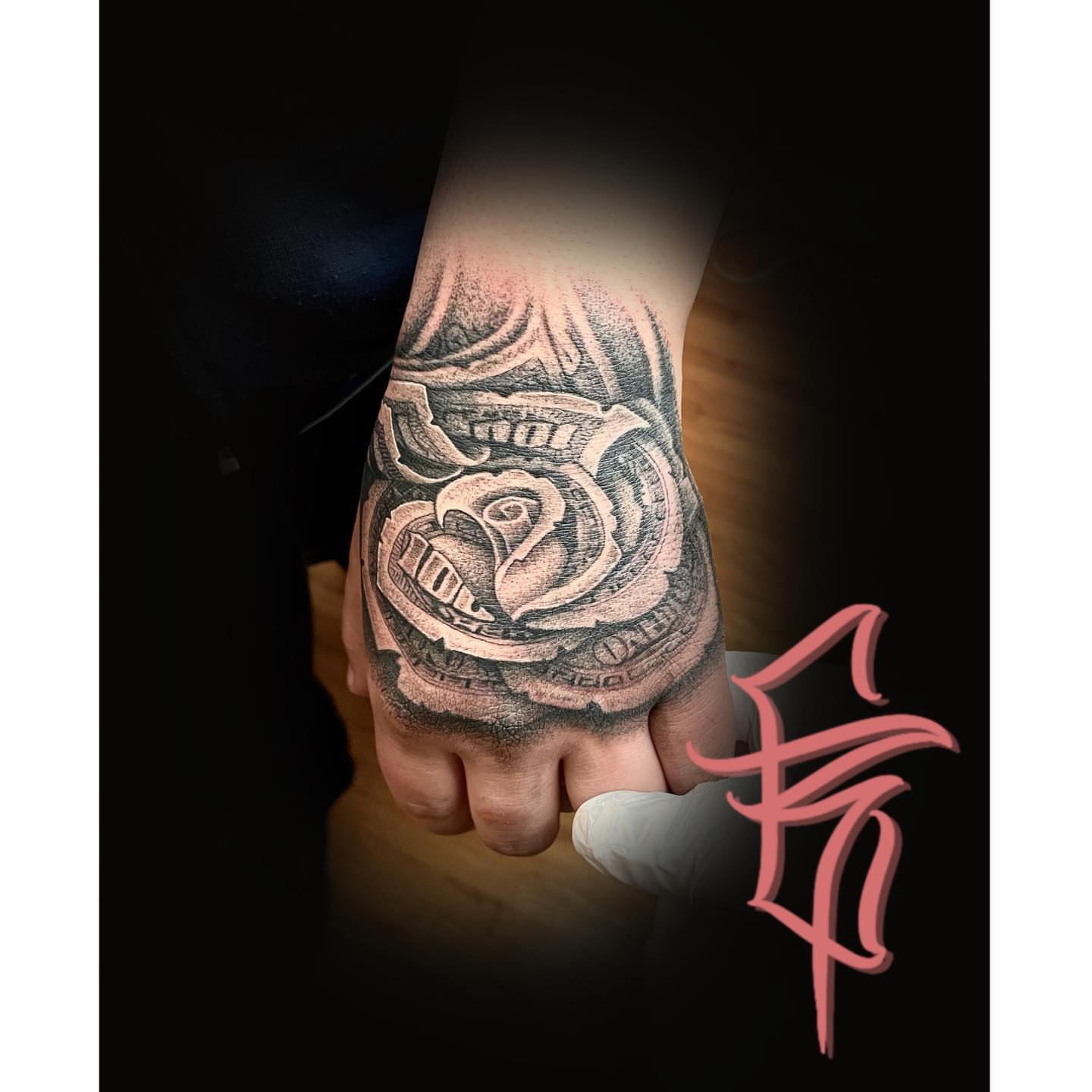 Mechanical rose realism tattoo on the hand by Fullerton ca tattooing
