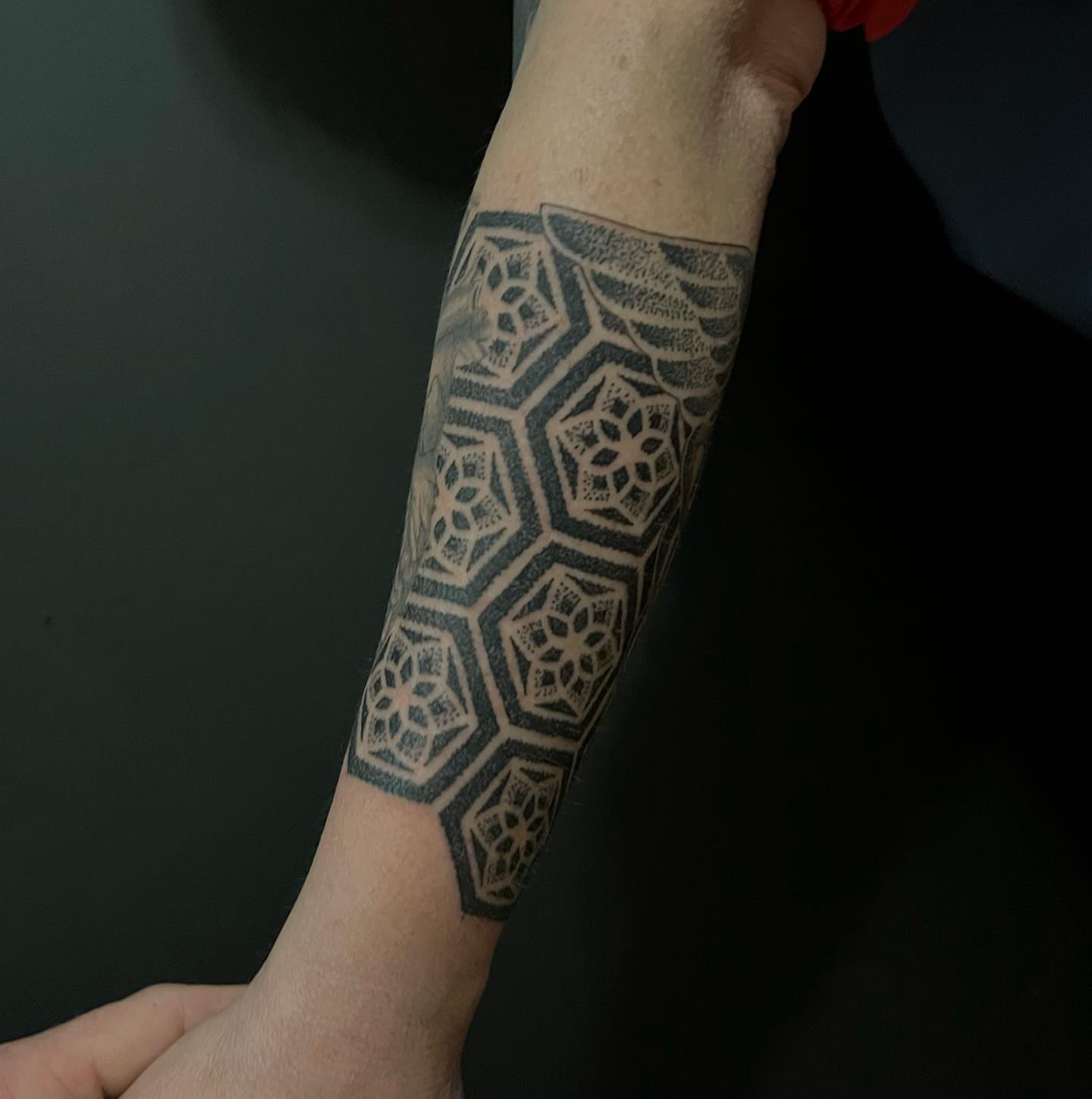 Geometric pattern geometric tattoo on the forearm by Ałex, Portland, Oregon