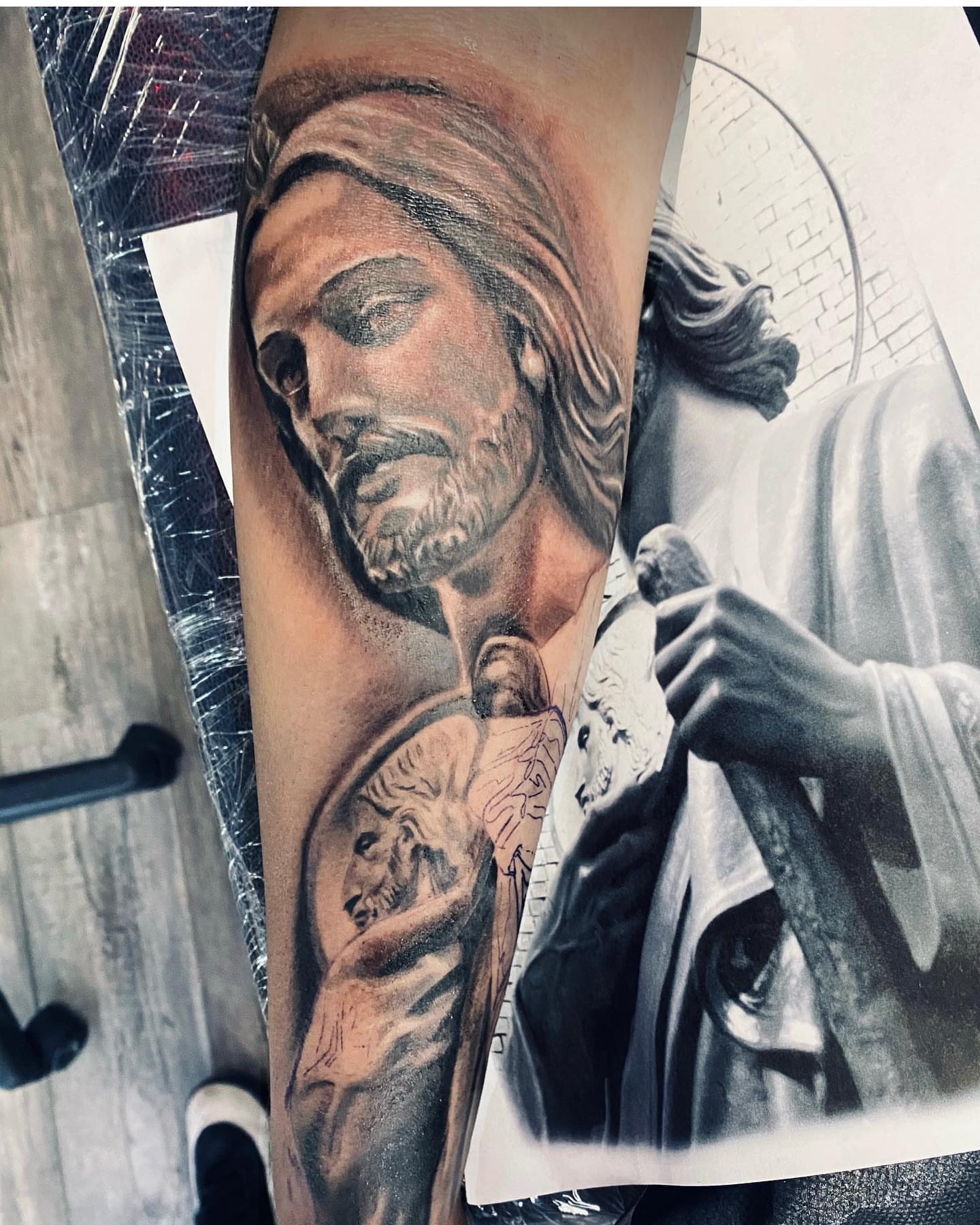 Tattoo by @lv1tattoos — realism, black_and_grey