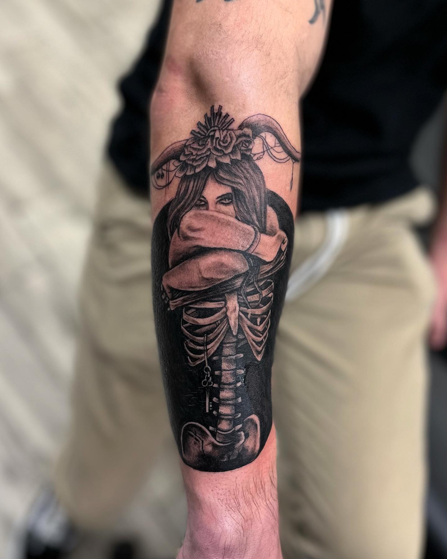 Woman with roses realism tattoo on the forearm by Monique Ortiz, Mesa, Arizona