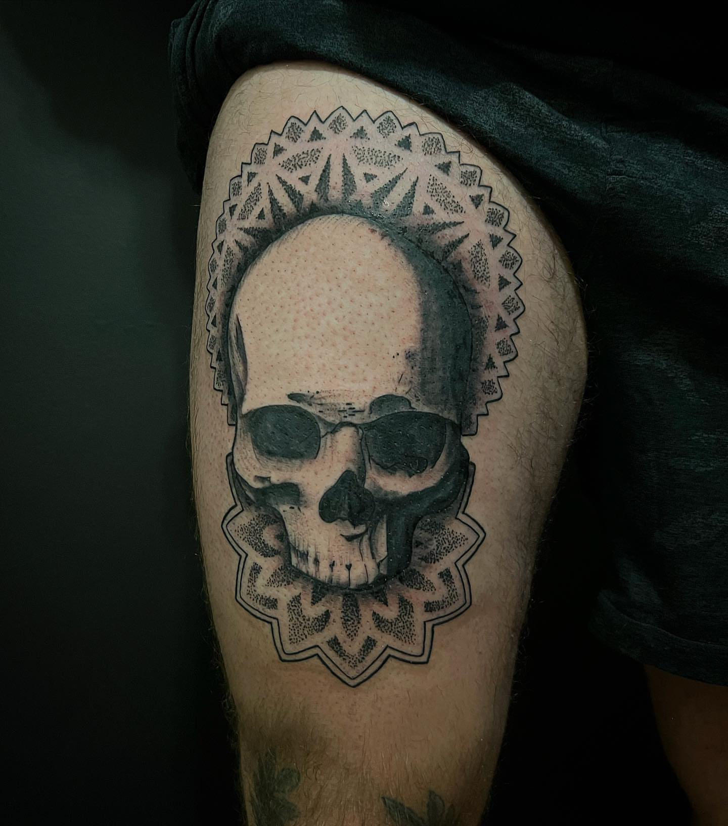 Skull dotwork tattoo on the thigh by Ałex, Portland, Oregon