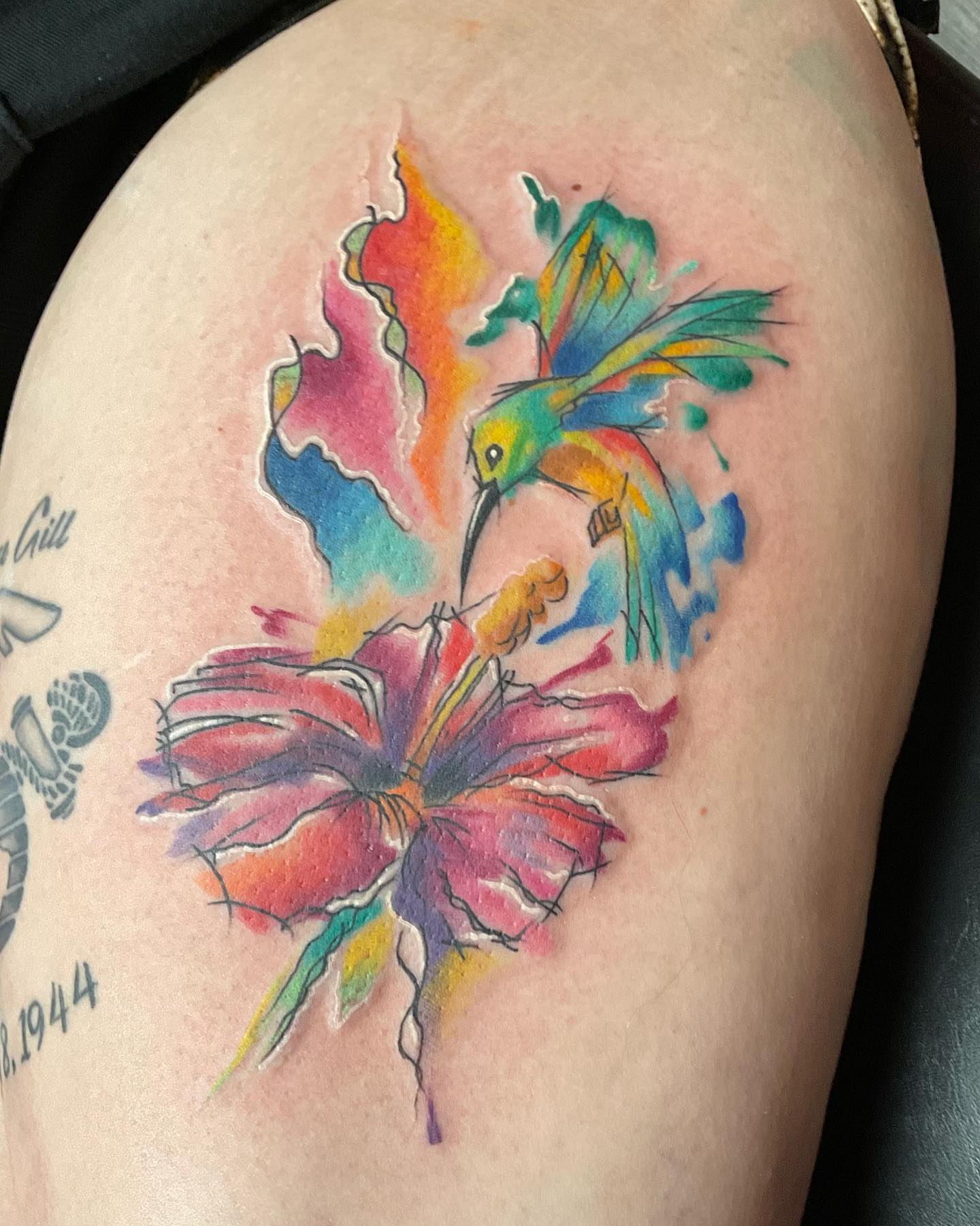 Tattoo by @huckleberrytattoos — watercolor