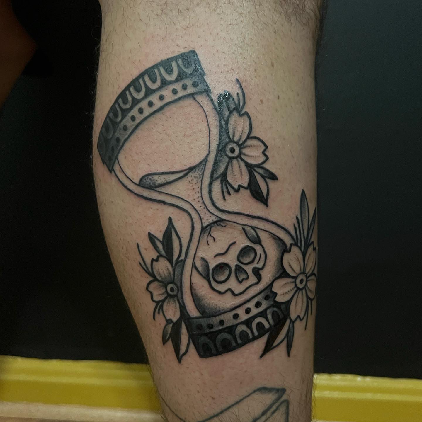 Hourglass and skull black and grey tattoo on the forearm by Ałex, Portland, Oregon