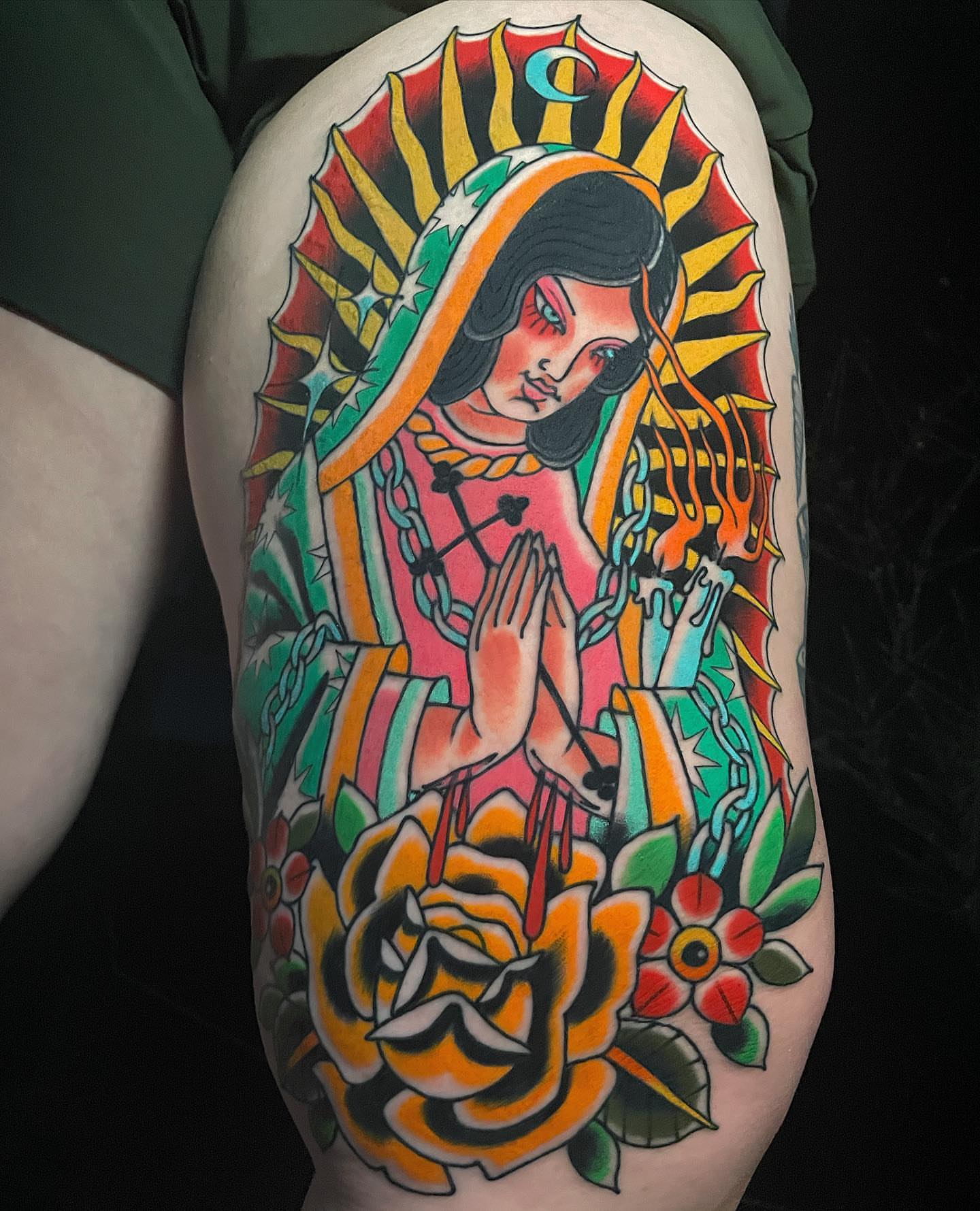 Our Lady of Guadalupe American traditional tattoo on the thigh by Frank Mostek