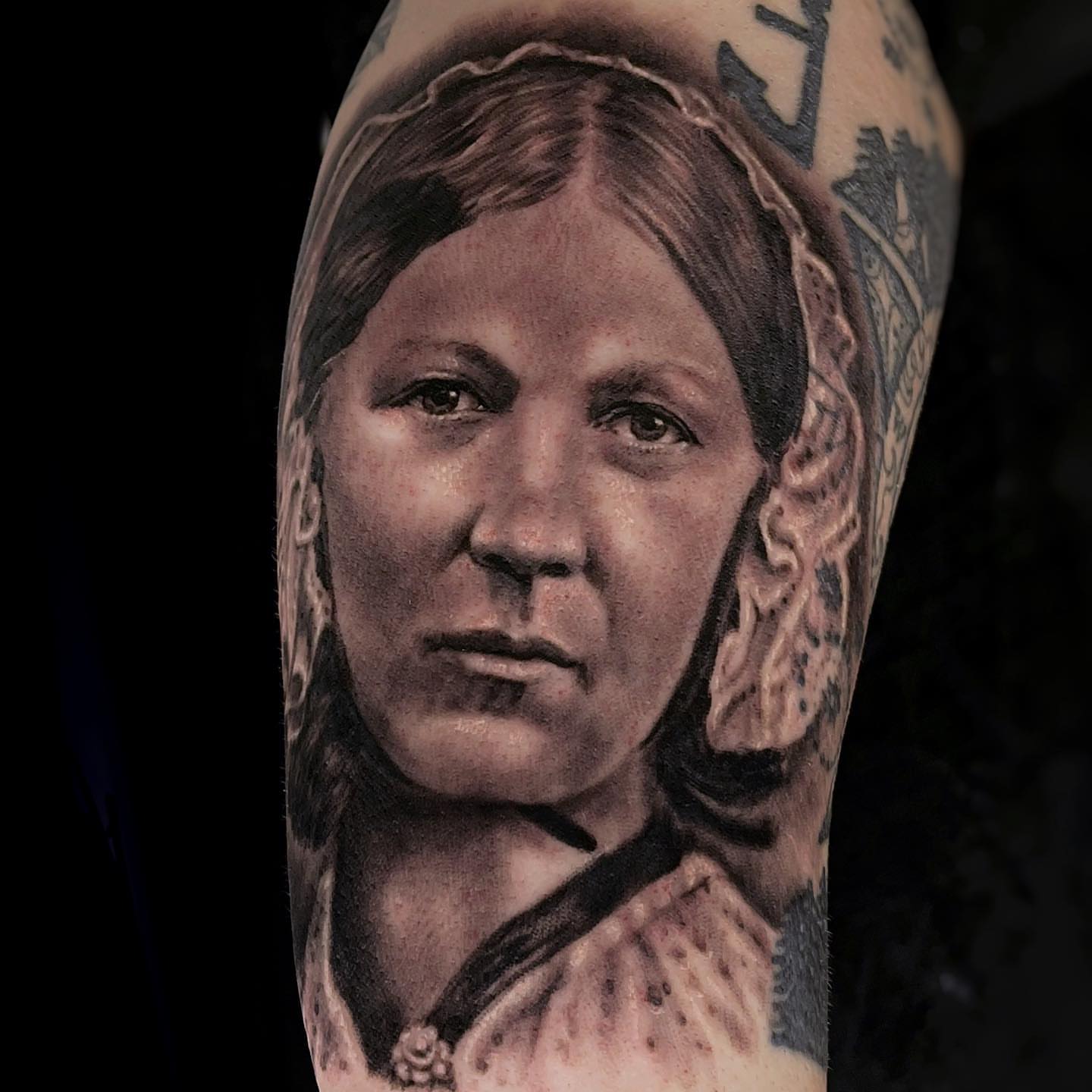 Portrait of a woman realism tattoo on the forearm by Rusty Dornhecker, Columbus, Ohio