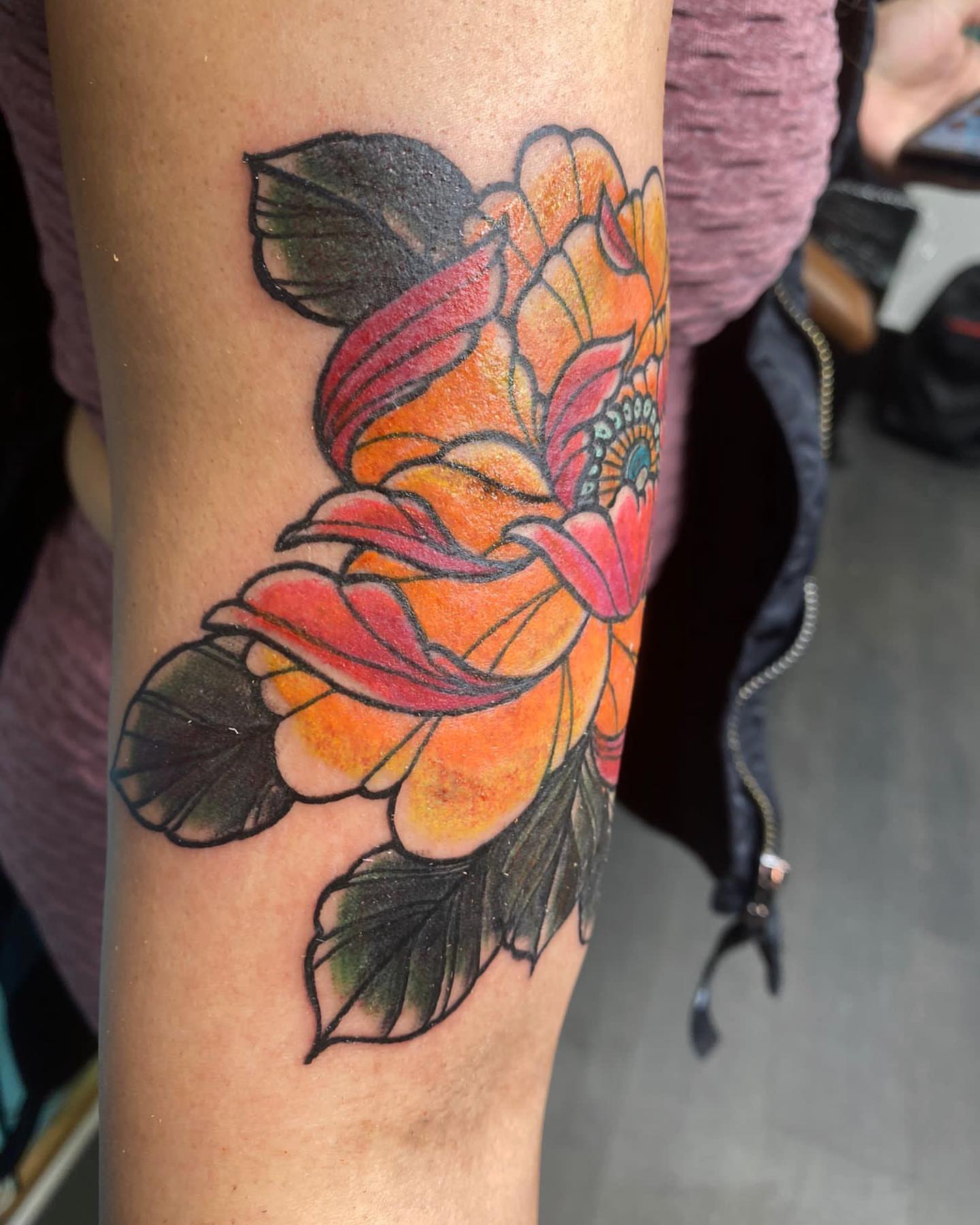 Flower new school tattoo on the forearm by Alberto Ramirez
