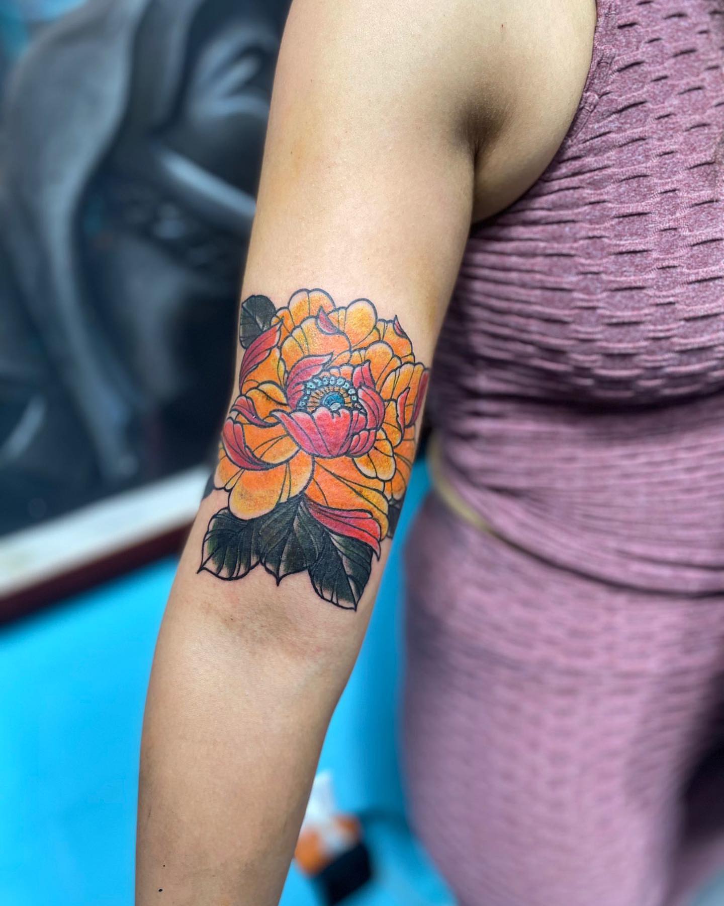 Peony new school tattoo on the forearm by Alberto Ramirez