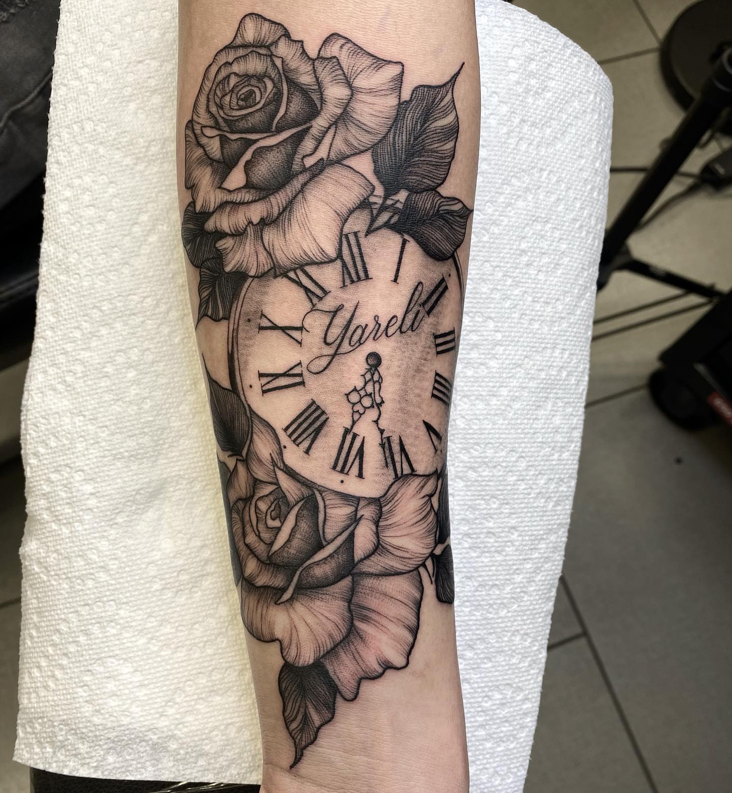 Clock and roses realism tattoo on the forearm by Dayana✨