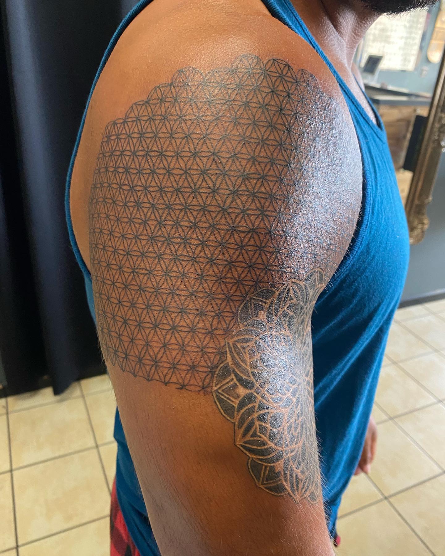 Geometric pattern geometric tattoo on the shoulder by Nicholas Jones