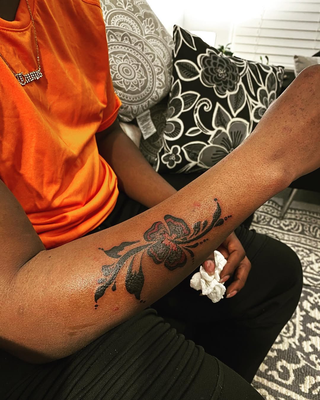 Flower and vine tattoo on the forearm by Danimals