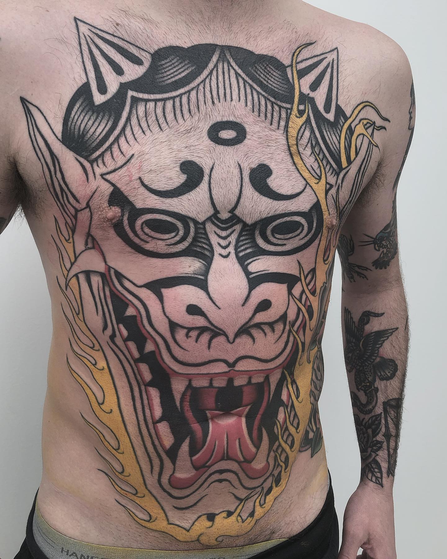 Demon mask japanese irezumi tattoo on the back by Jay Breen