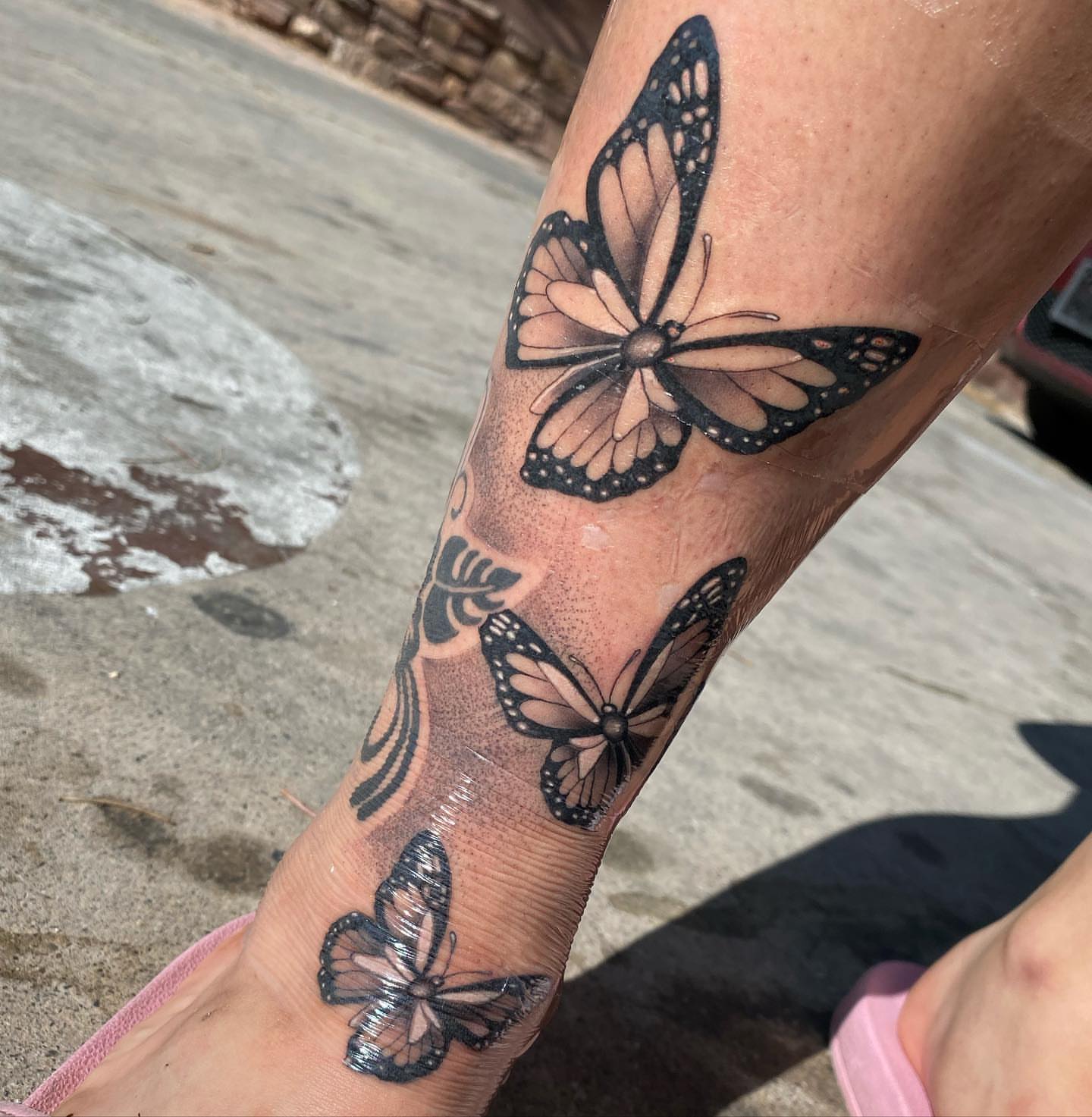 Butterflies realism tattoo on the forearm by LifesGrape