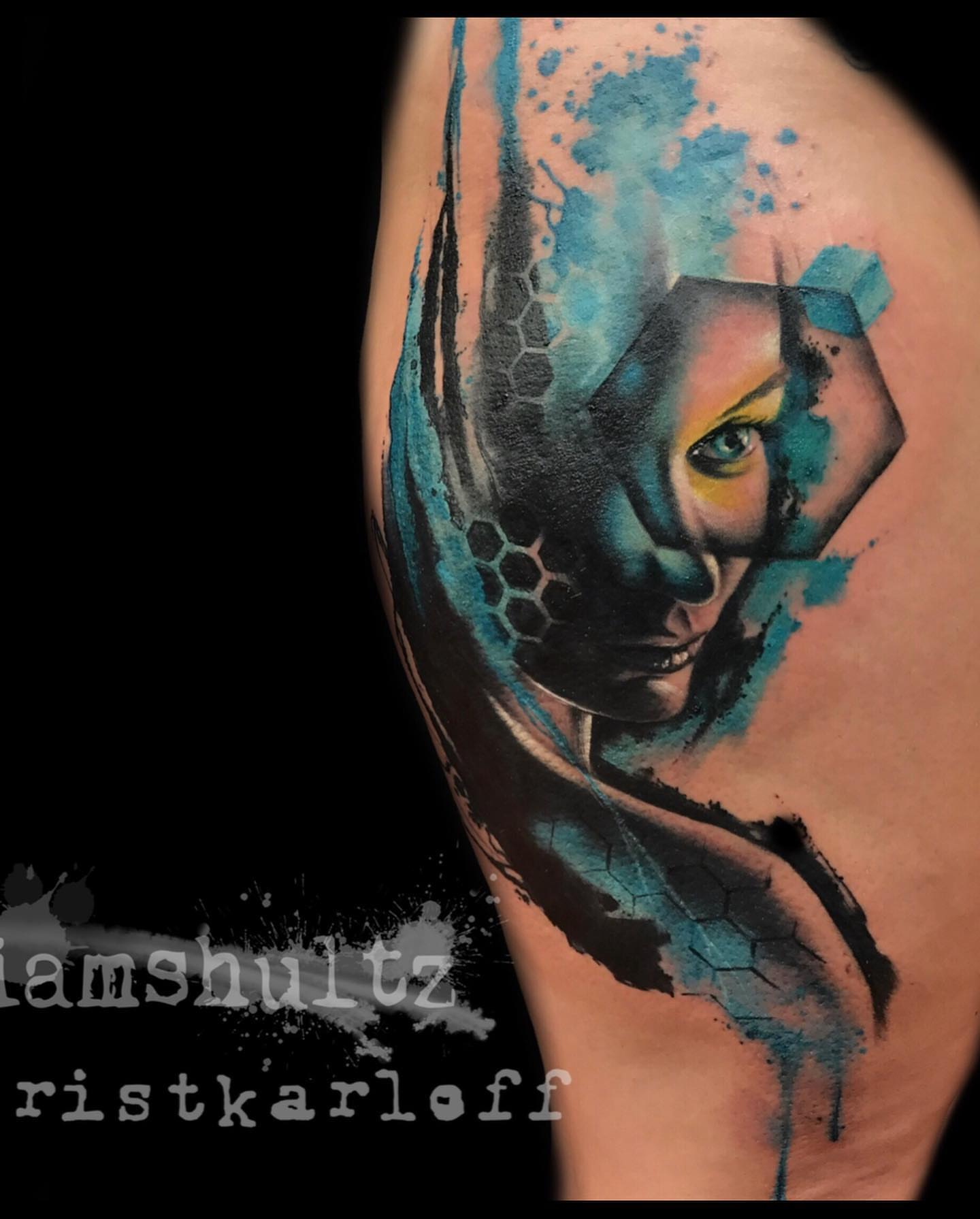 Abstract woman watercolor tattoo on the shoulder by Mike Shultz