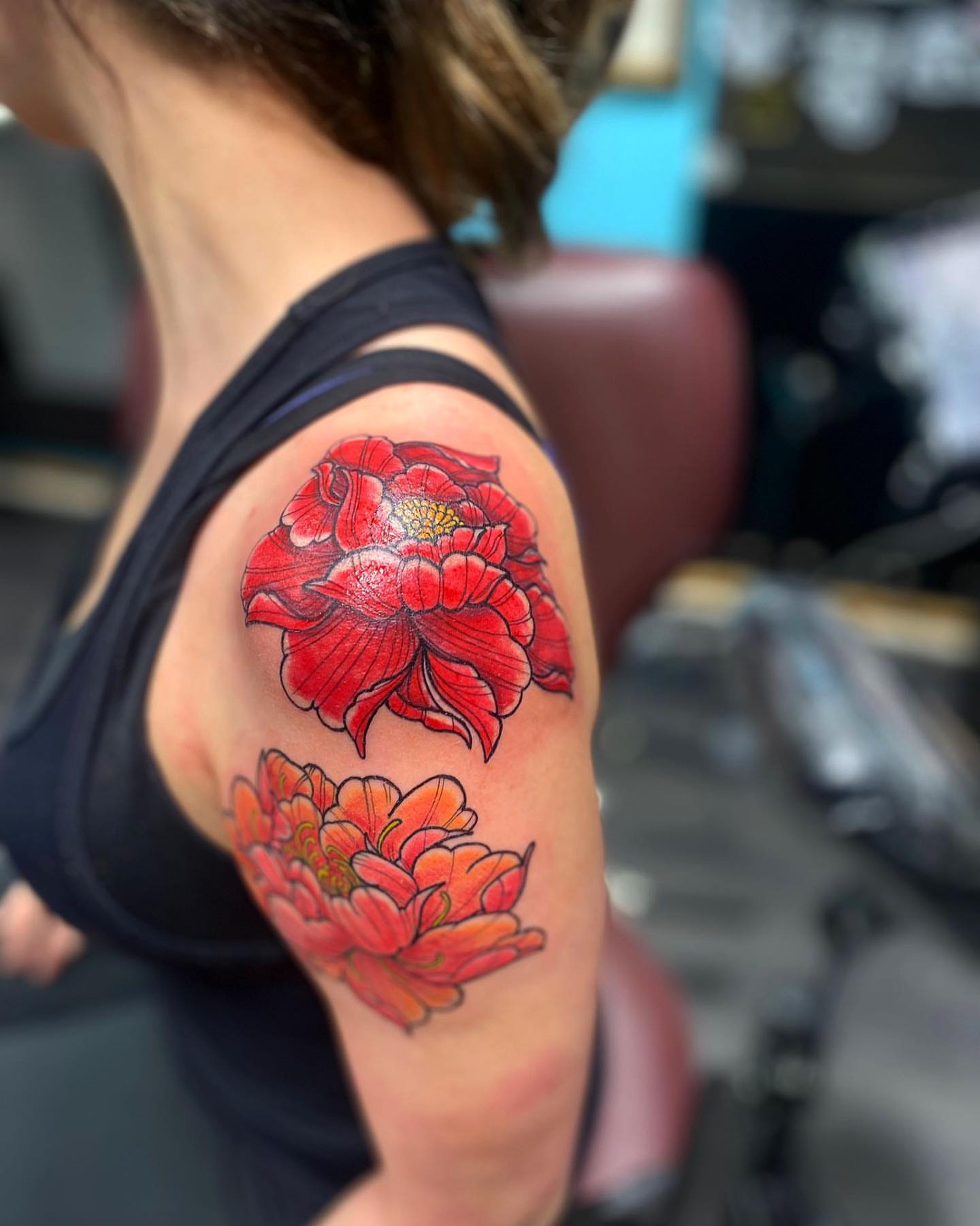 Peony flowers realism tattoo on the shoulder by Alberto Ramirez