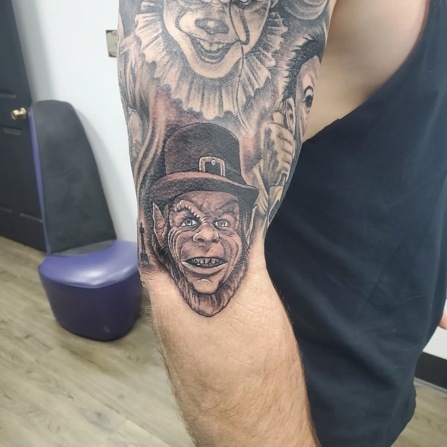 Clown and monkey realism tattoo on the forearm by @stevison15