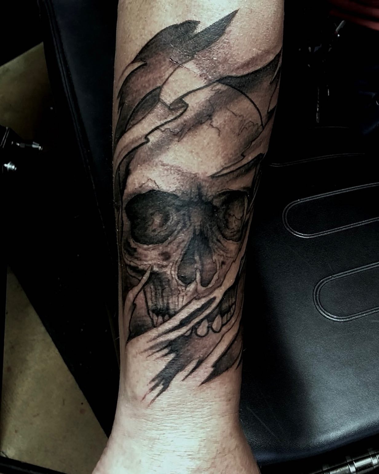 Skull realism tattoo on the forearm by Tattoos by Dave