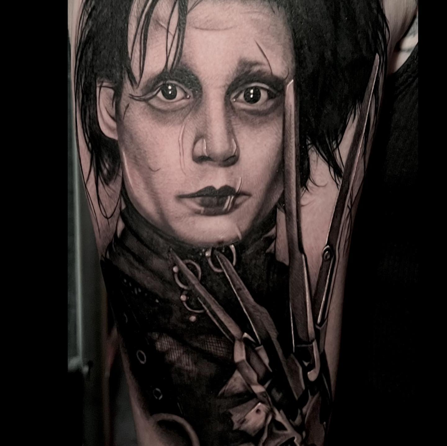 Edward Scissorhands dark realism tattoo on the forearm by Chelsea Darling