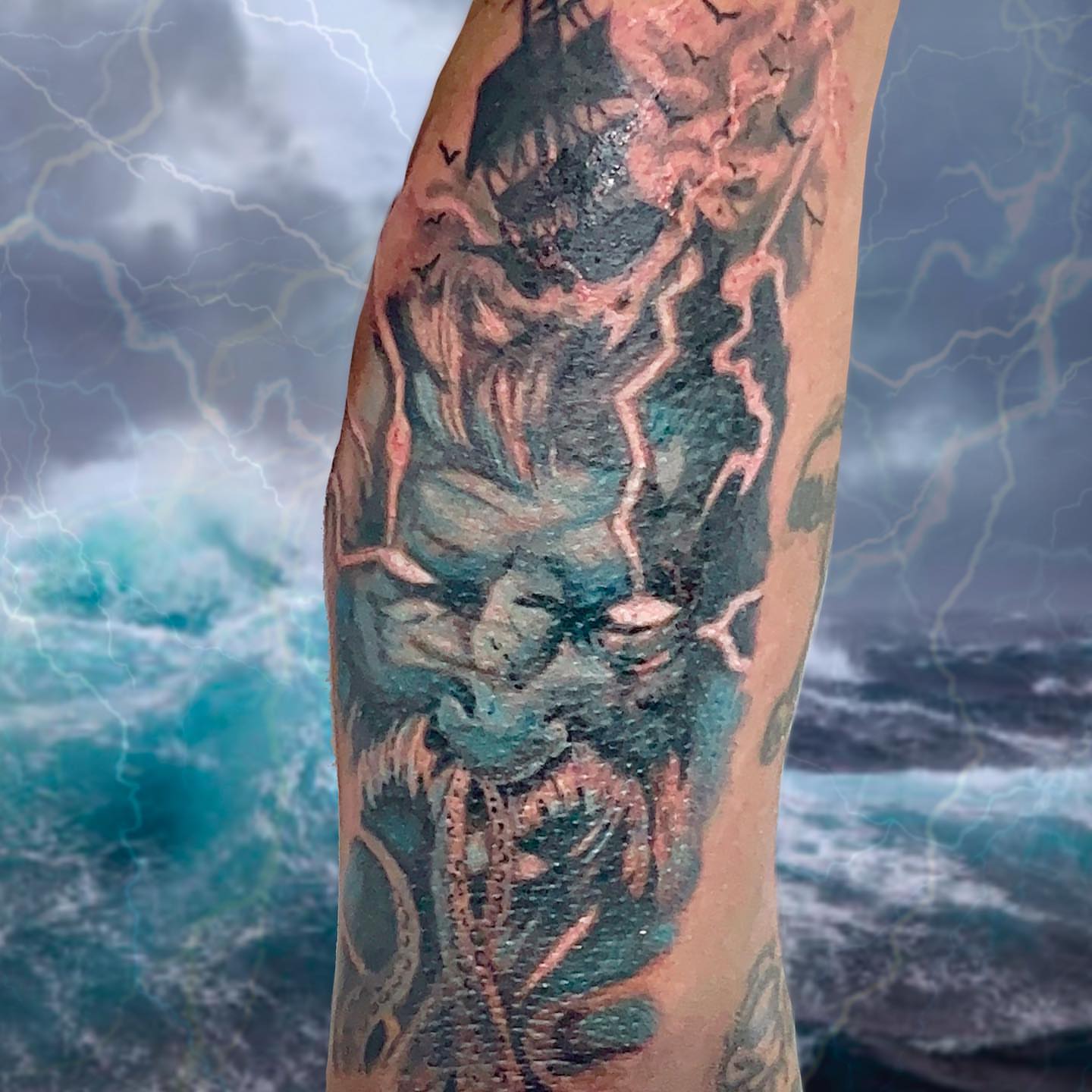 Stormy sea realism tattoo on the forearm by Dre Inks
