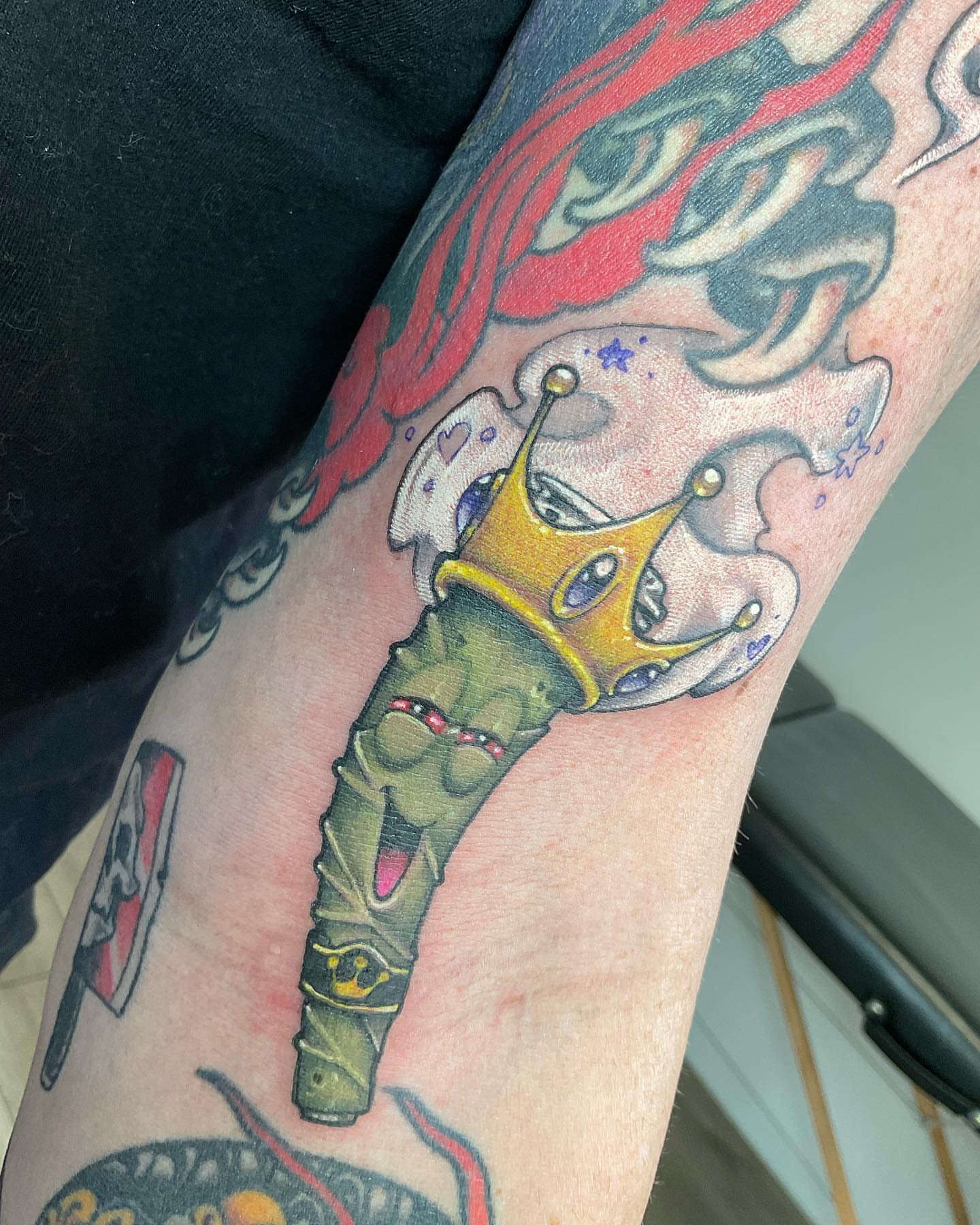 Kingly scepter new school tattoo on the forearm by Angell Tattoo Artist, Denver, Colorado