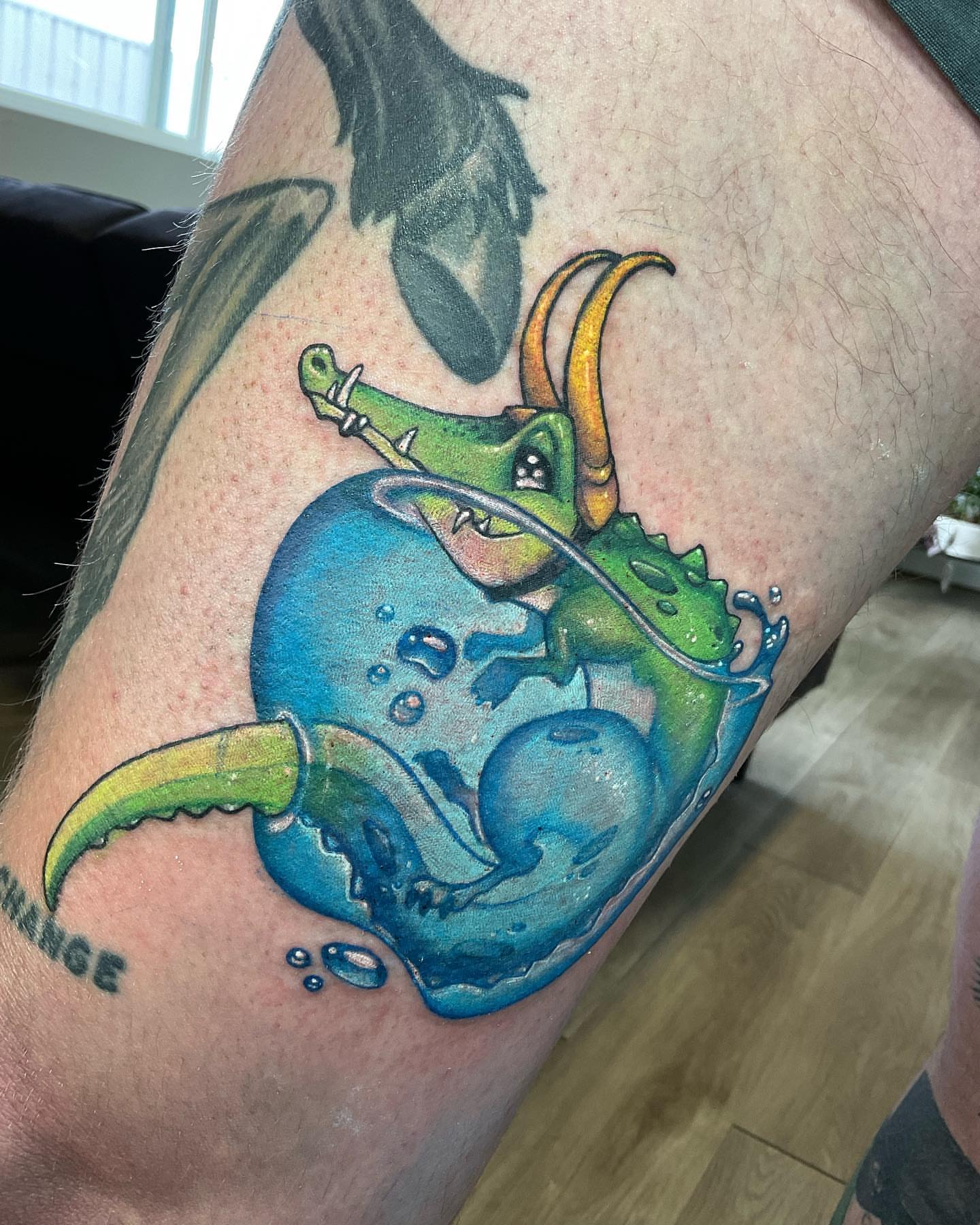 Dragon new school tattoo on the forearm by Angell Tattoo Artist, Denver, Colorado