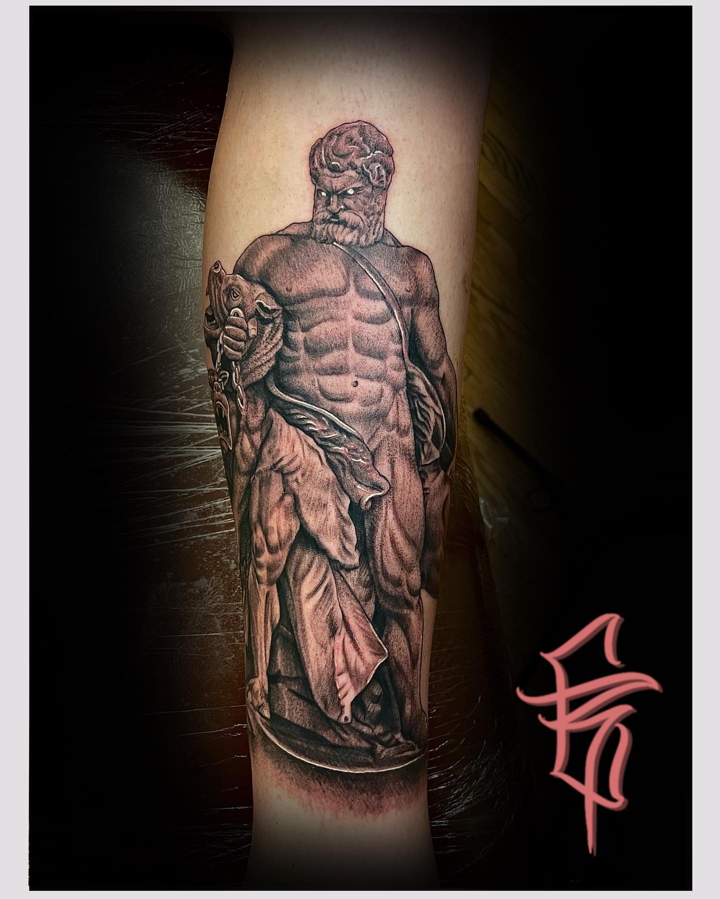 Statue-like figure realism tattoo on the forearm by Fullerton ca tattooing