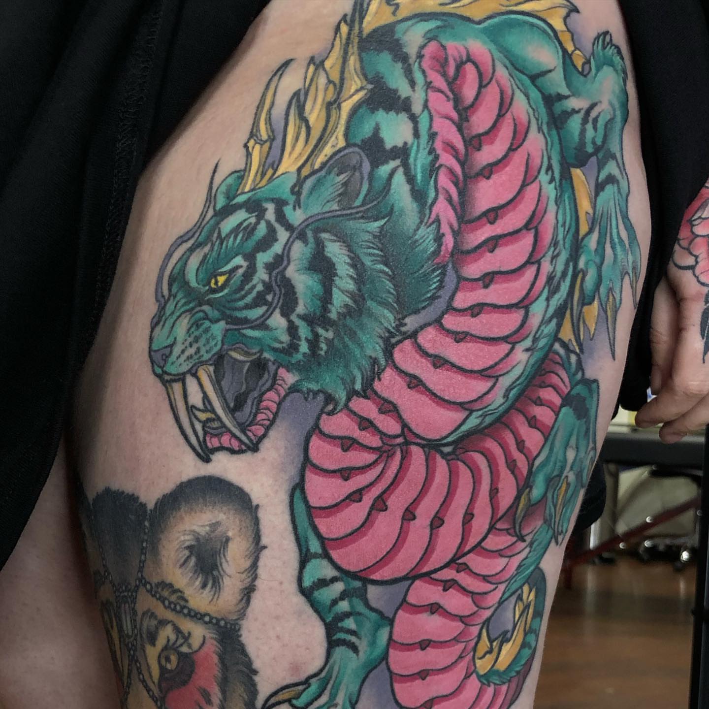 Tiger japanese irezumi tattoo on the thigh by Aaron Borden