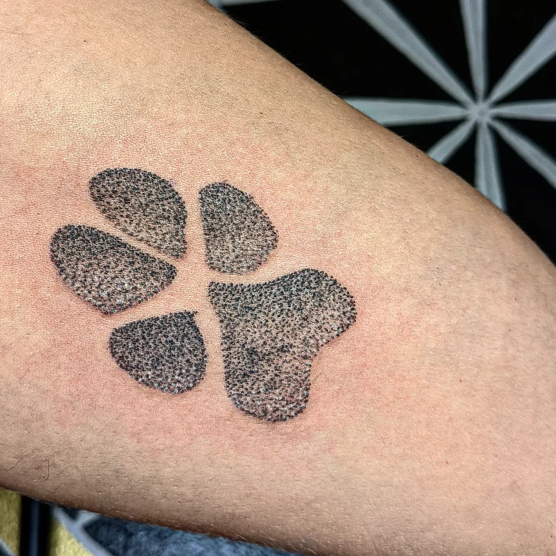 Four-leaf clover dotwork tattoo on the forearm by Aim 🤍