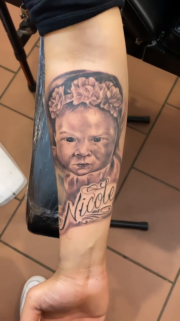 Baby portrait with name realism tattoo by Breyner, Cambridge, Massachusetts