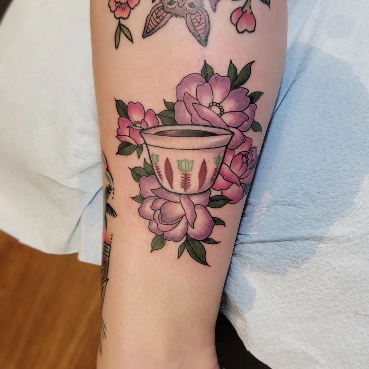 Tea cup and roses American traditional tattoo on the forearm by ๐๏ธ, Ashland, Virginia