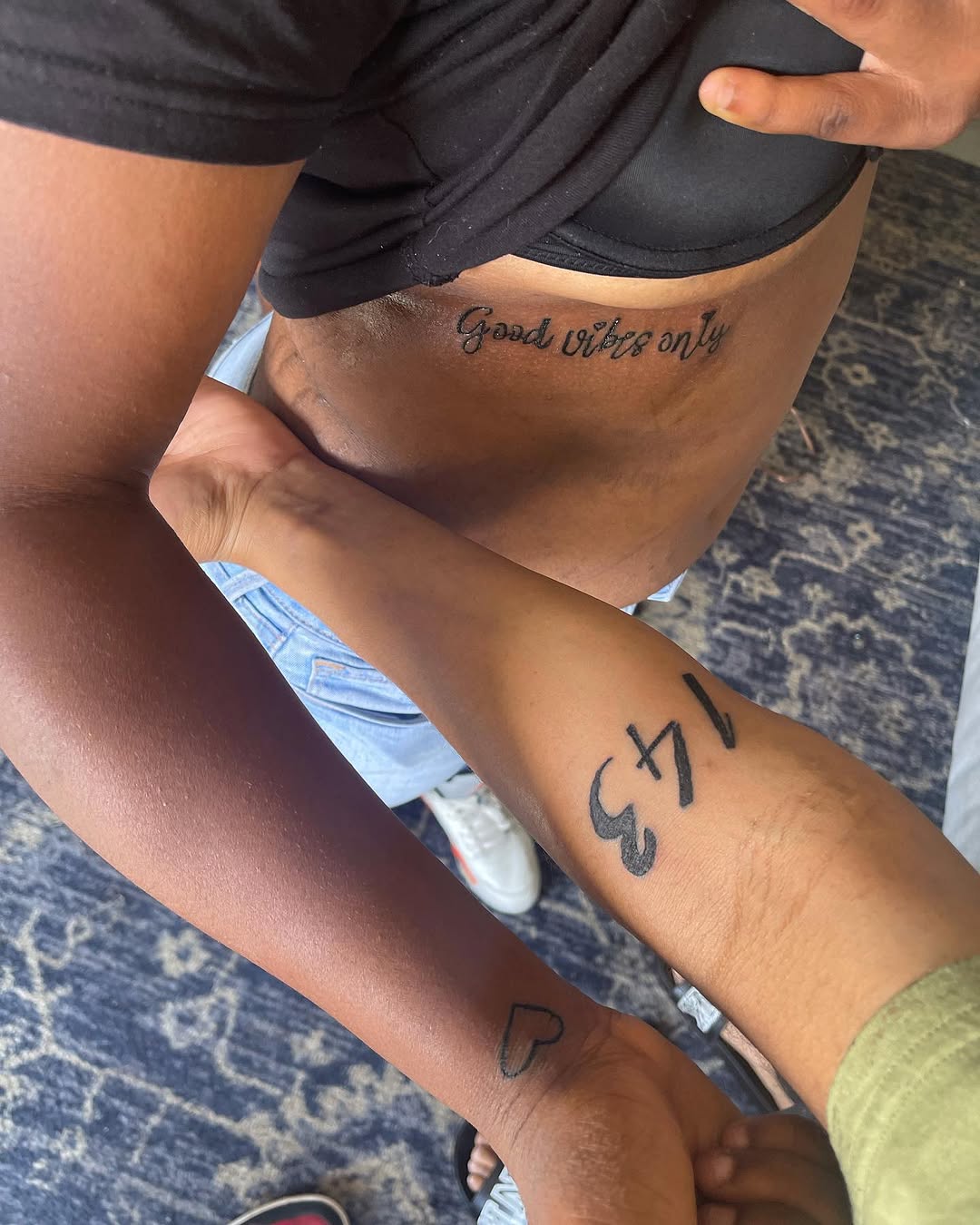 Script lettering and numbers lettering tattoo on the upper arm by InkByChing❤️🔥