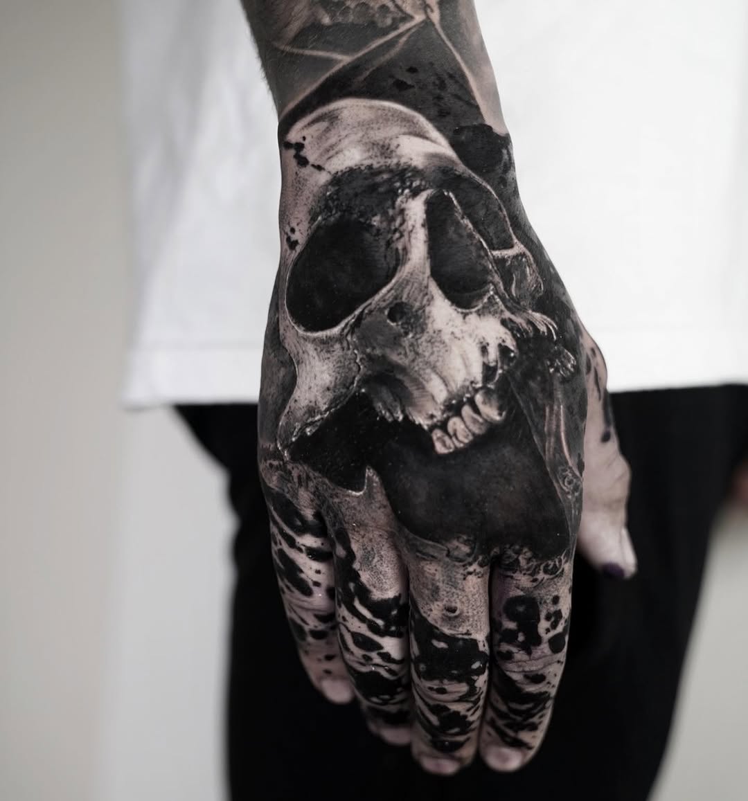 Skull dark art tattoo on the hand by Facundo Gil